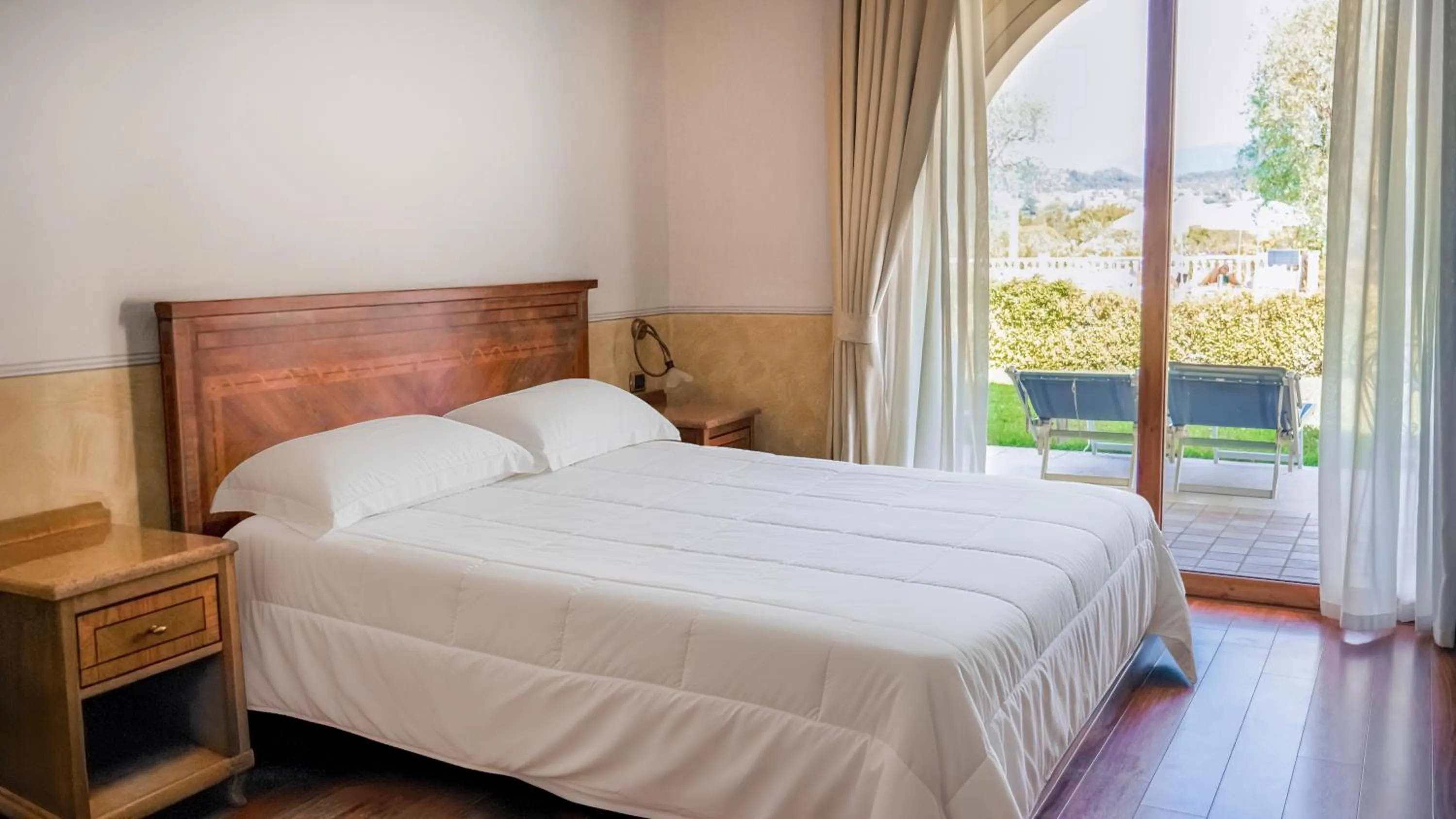 Bedroom, Bed in AHG Golf Hotel Porta Del Sole