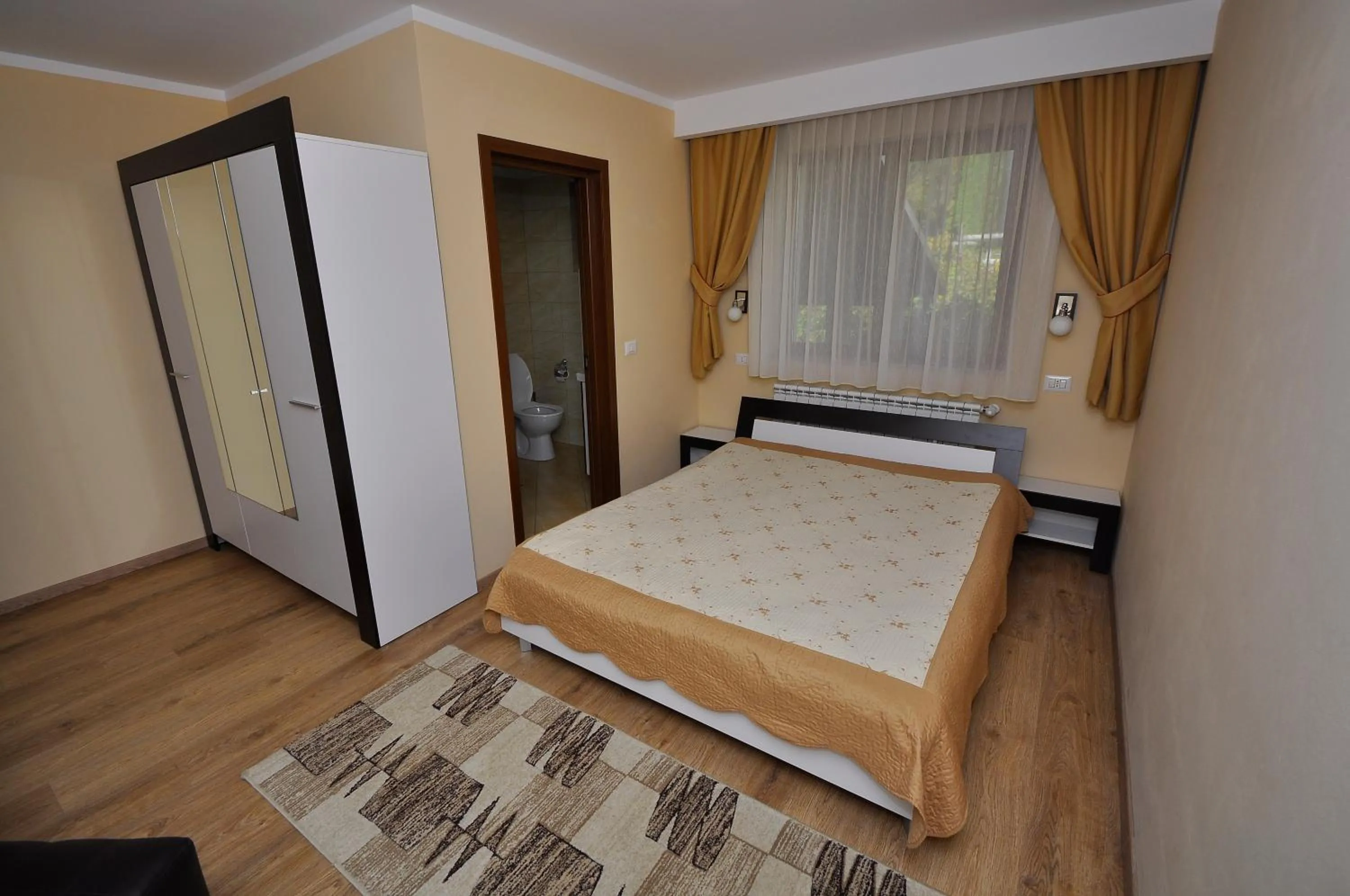Photo of the whole room, Bed in Pensiunea Eladi