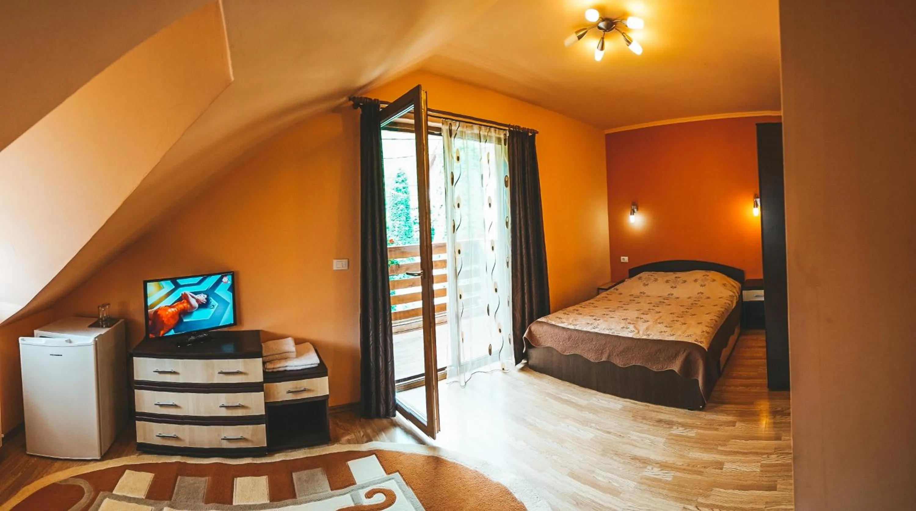 Bed in Pensiunea Eladi
