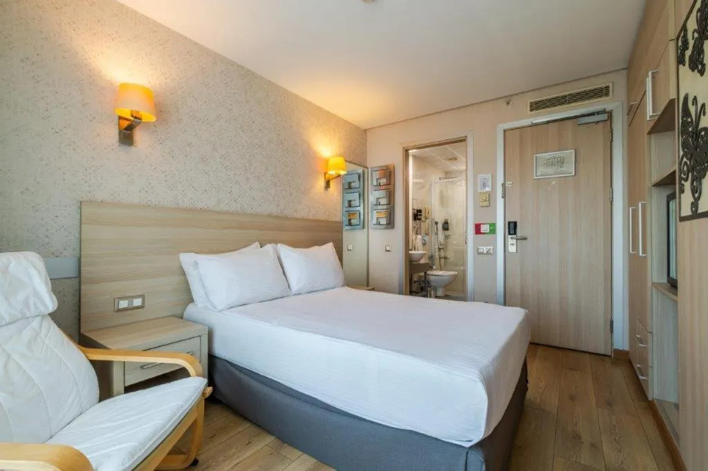 Bed in Ramada by Wyndham Ankara