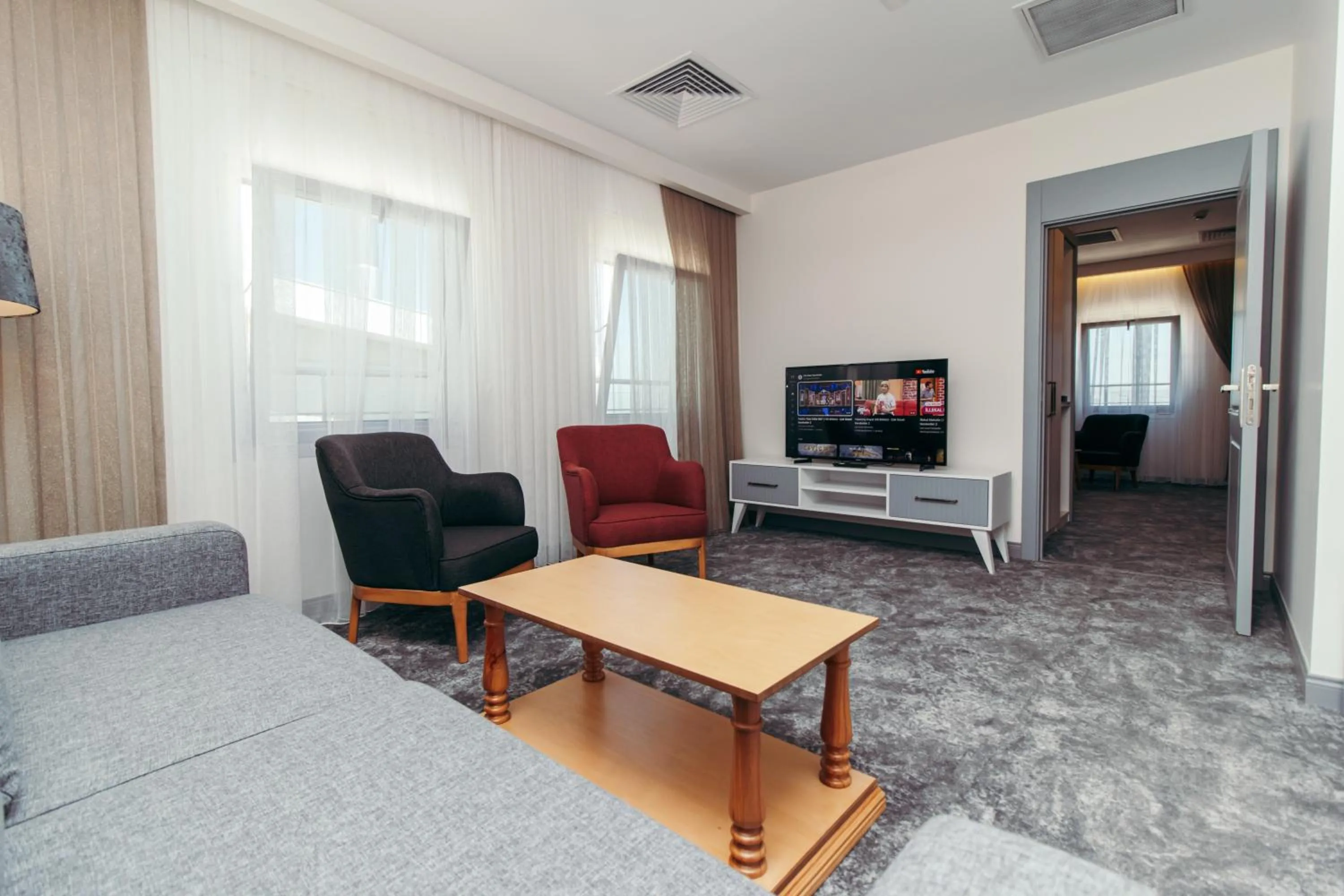 Living room in CK Farabi Hotel