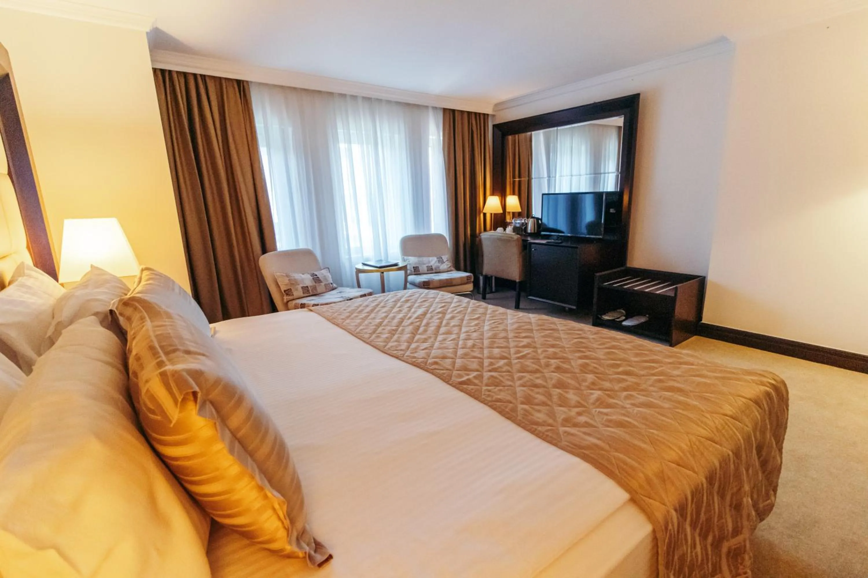 Photo of the whole room, Bed in CK Farabi Hotel