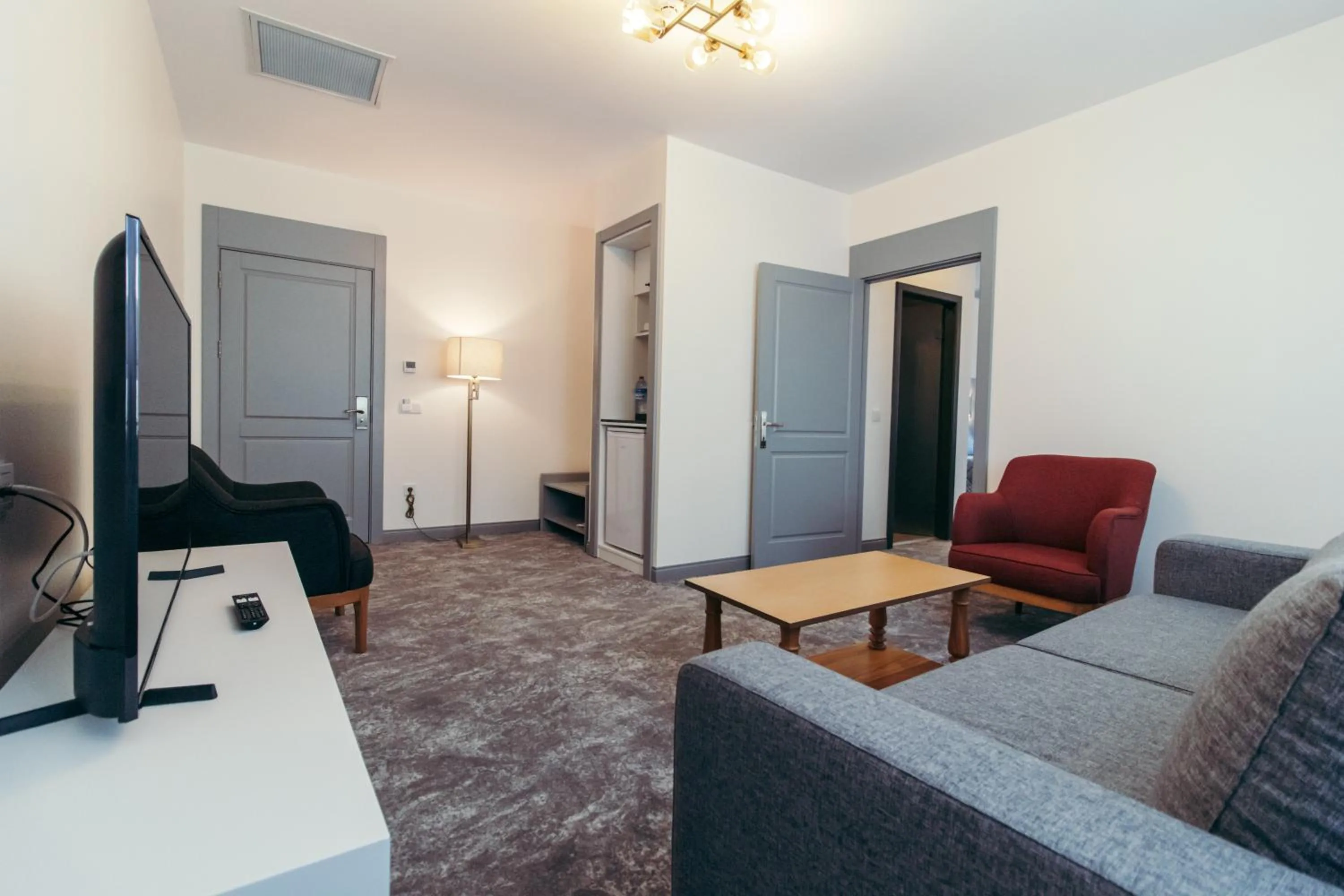 Communal lounge/ TV room in CK Farabi Hotel