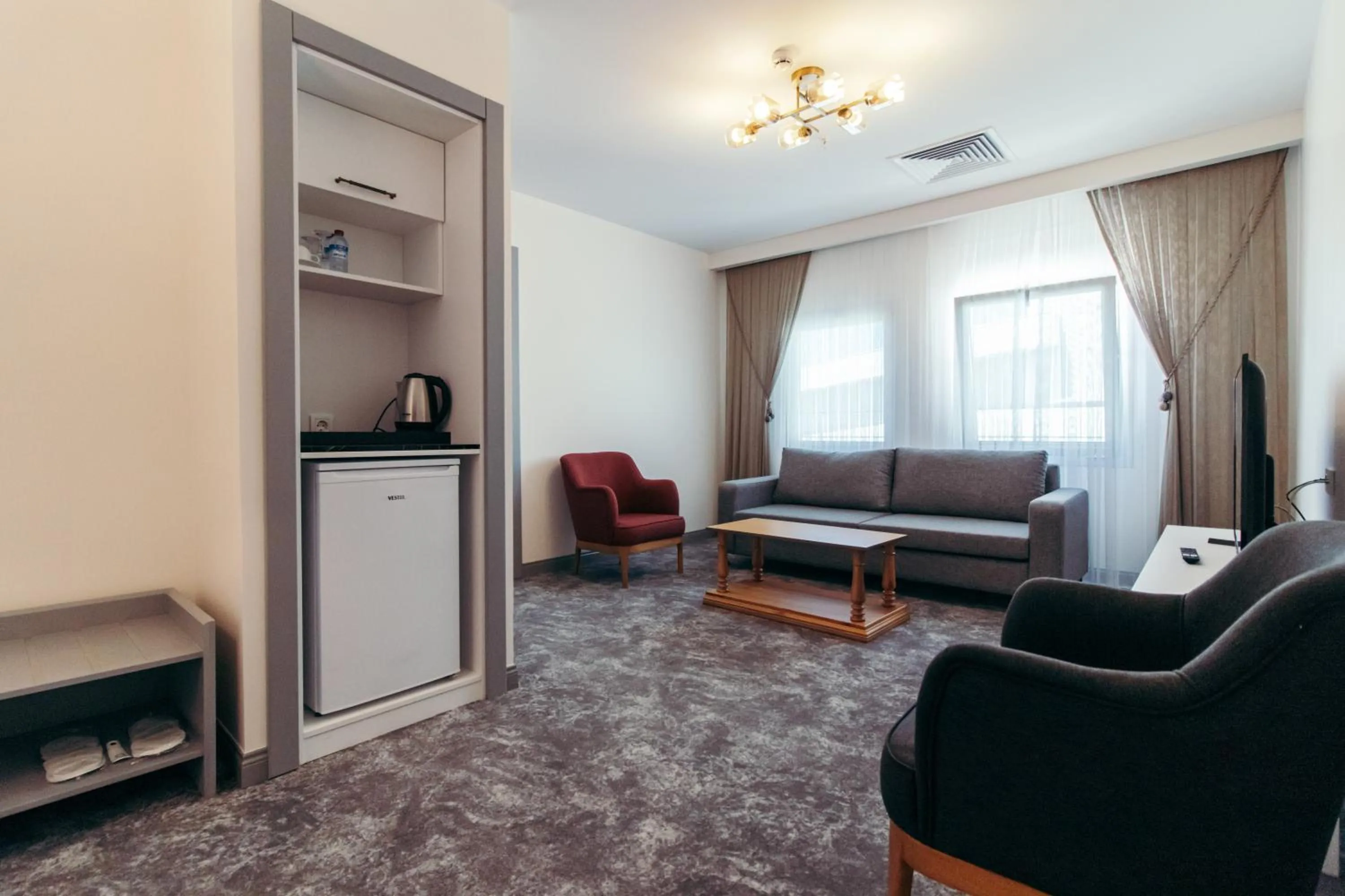 Living room in CK Farabi Hotel