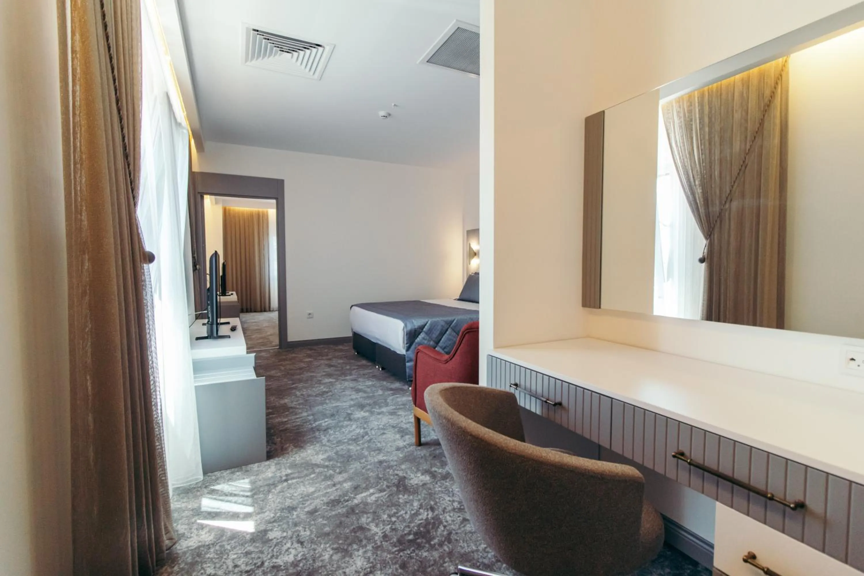 Bedroom, Bed in CK Farabi Hotel