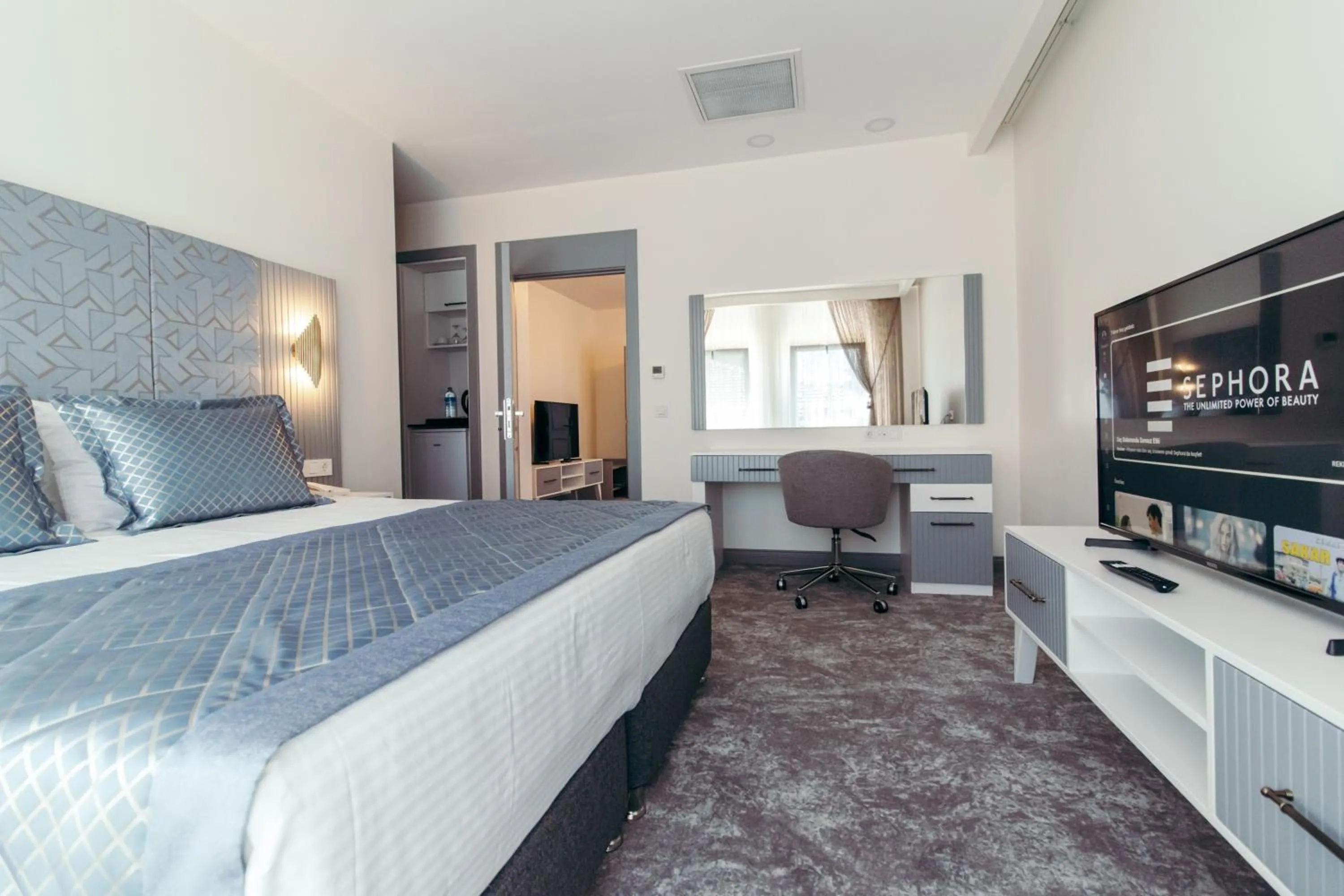 Bed in CK Farabi Hotel