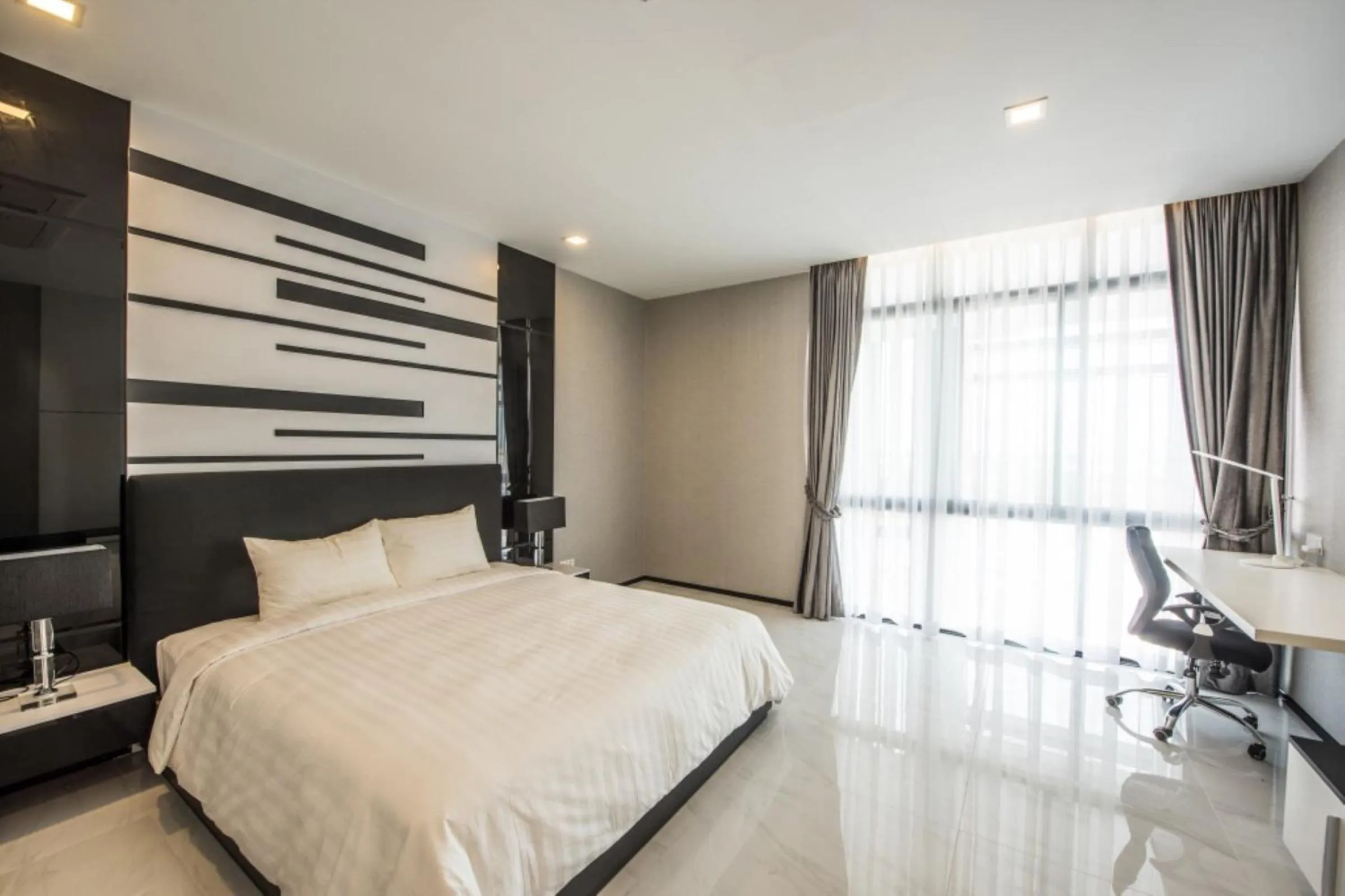TV and multimedia, Bed in Maline Exclusive Serviced Apartments