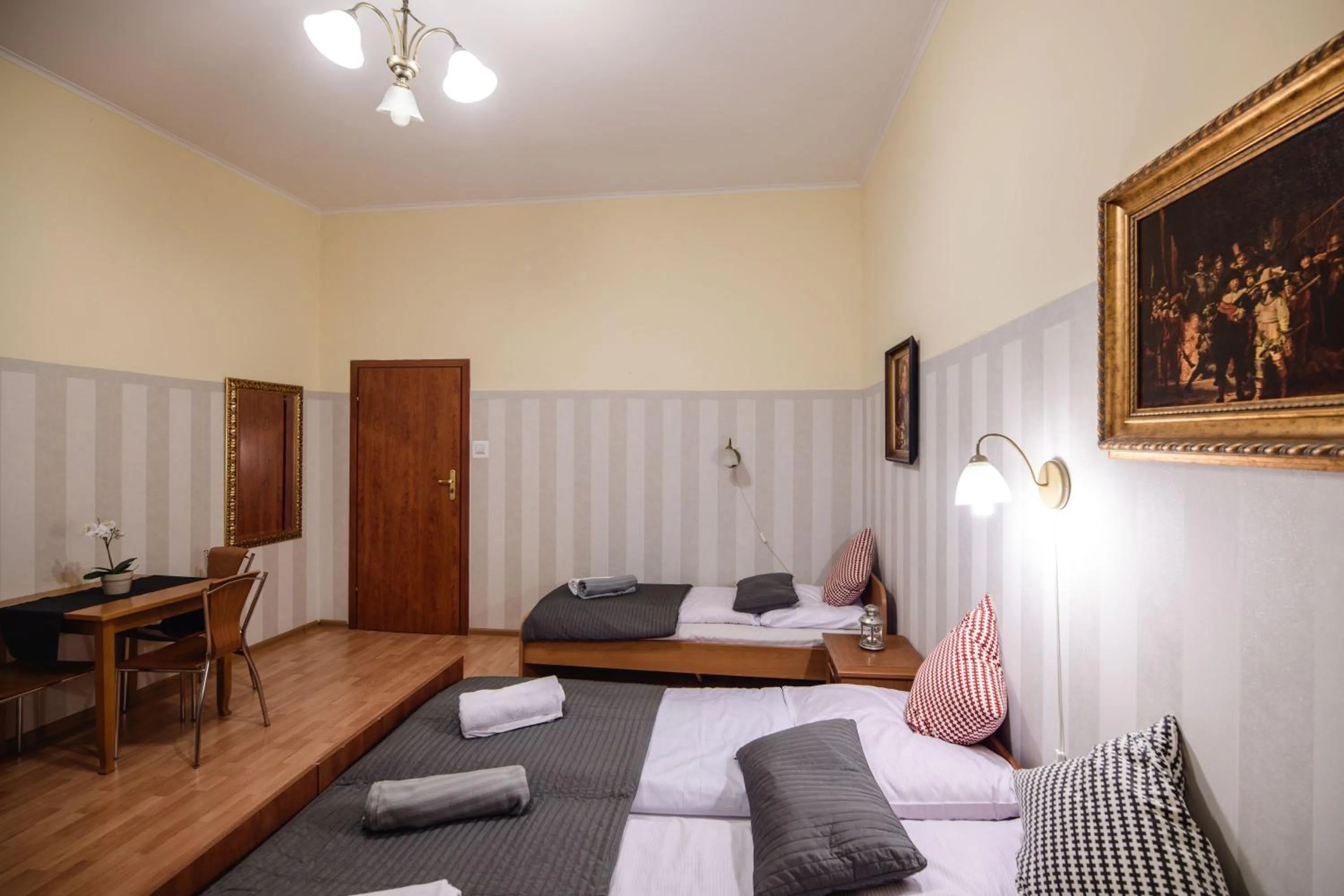 Photo of the whole room, Bed in Golden Lion Guest Rooms Szewska 19