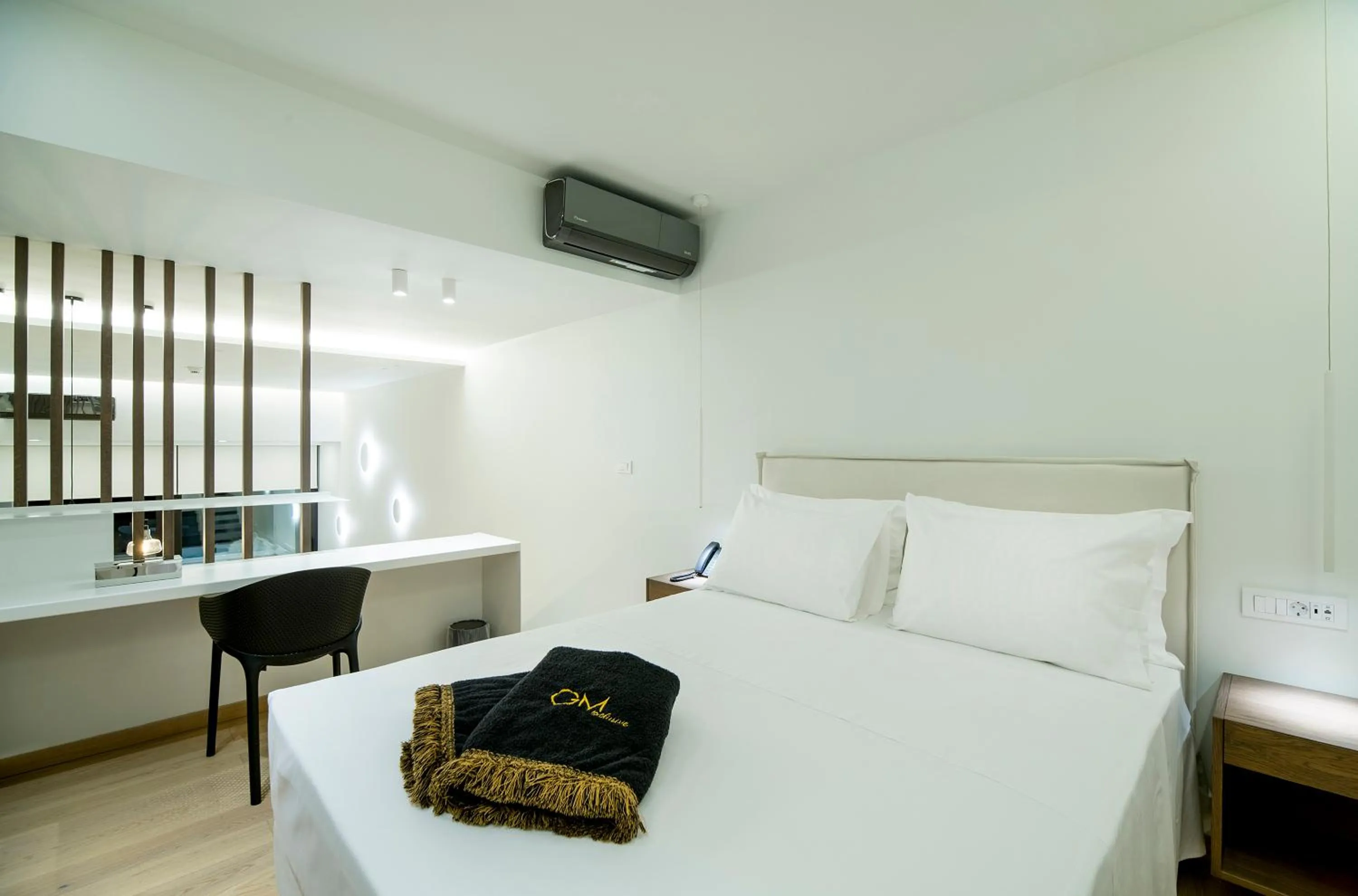 Bed in GM exclusive Luxury Suites & SPA