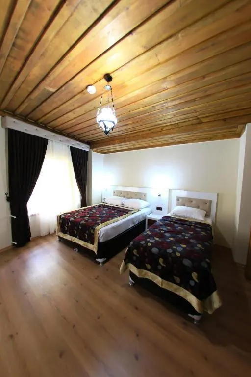 Bed in Bacchus Pension