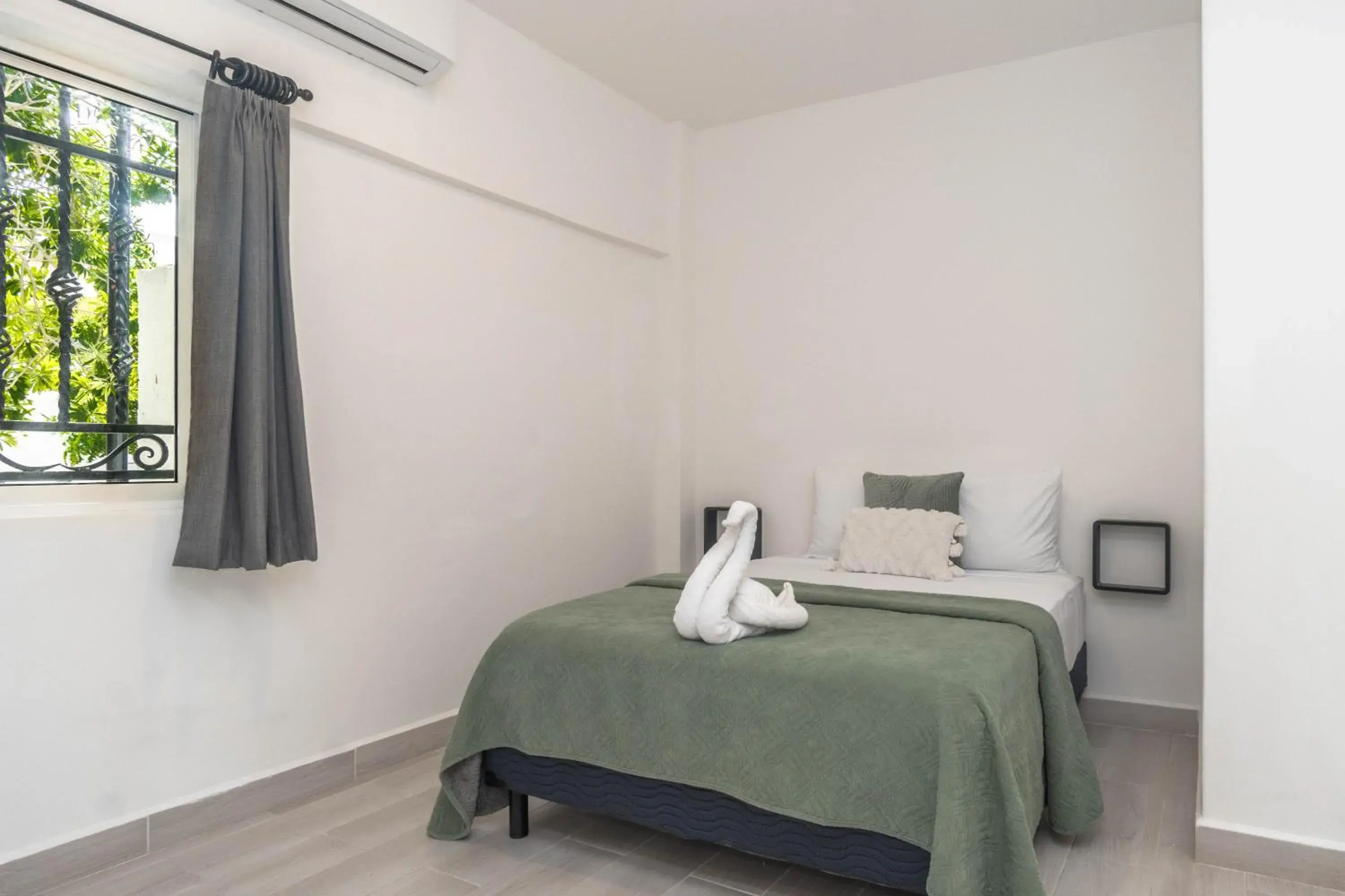 Bed in La Quinta Caribeña Bed in La Quinta Caribeña