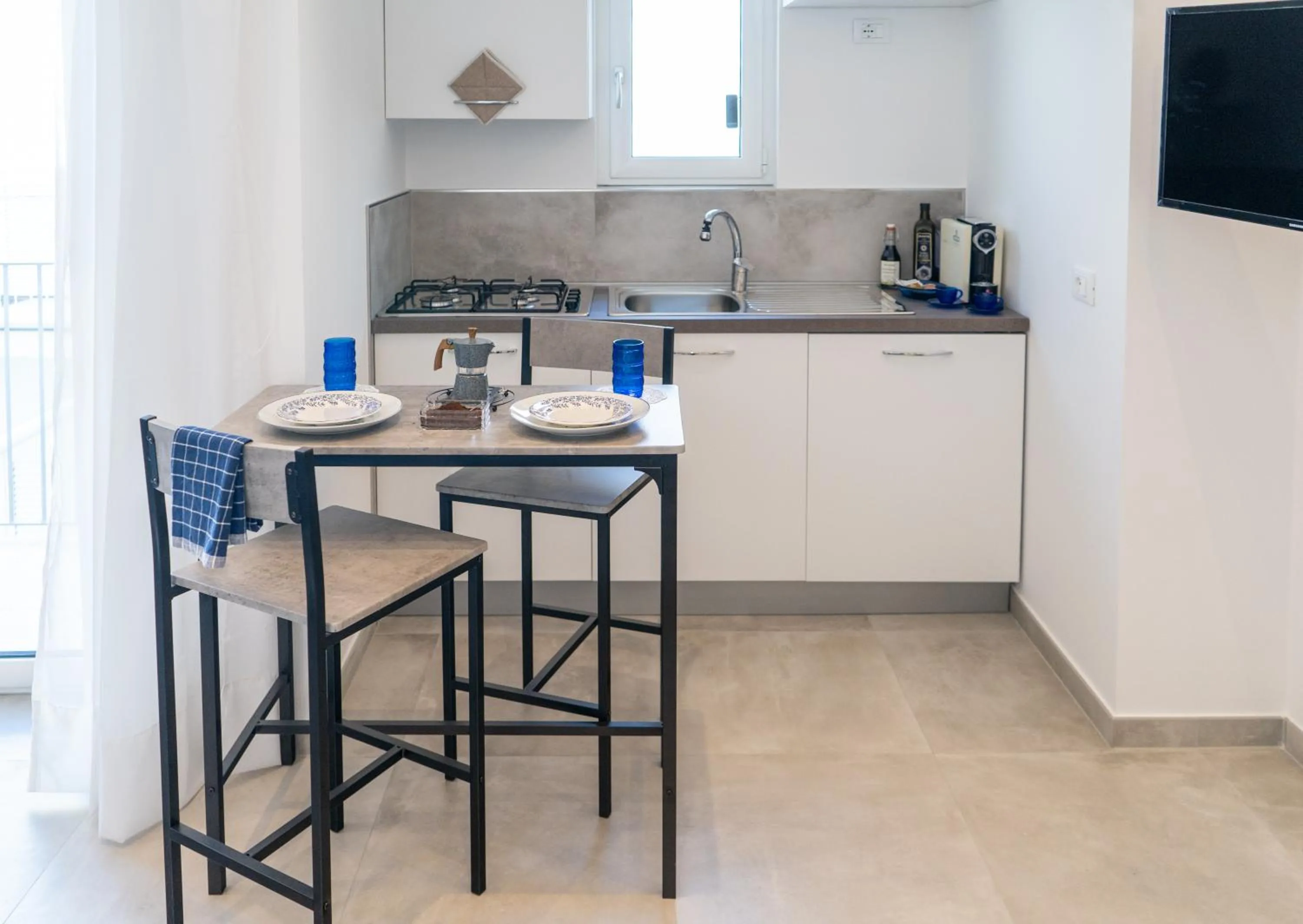 TV and multimedia in Delphi Soggiorni Romantic Suites with Private Terrace - Ischia Porto
