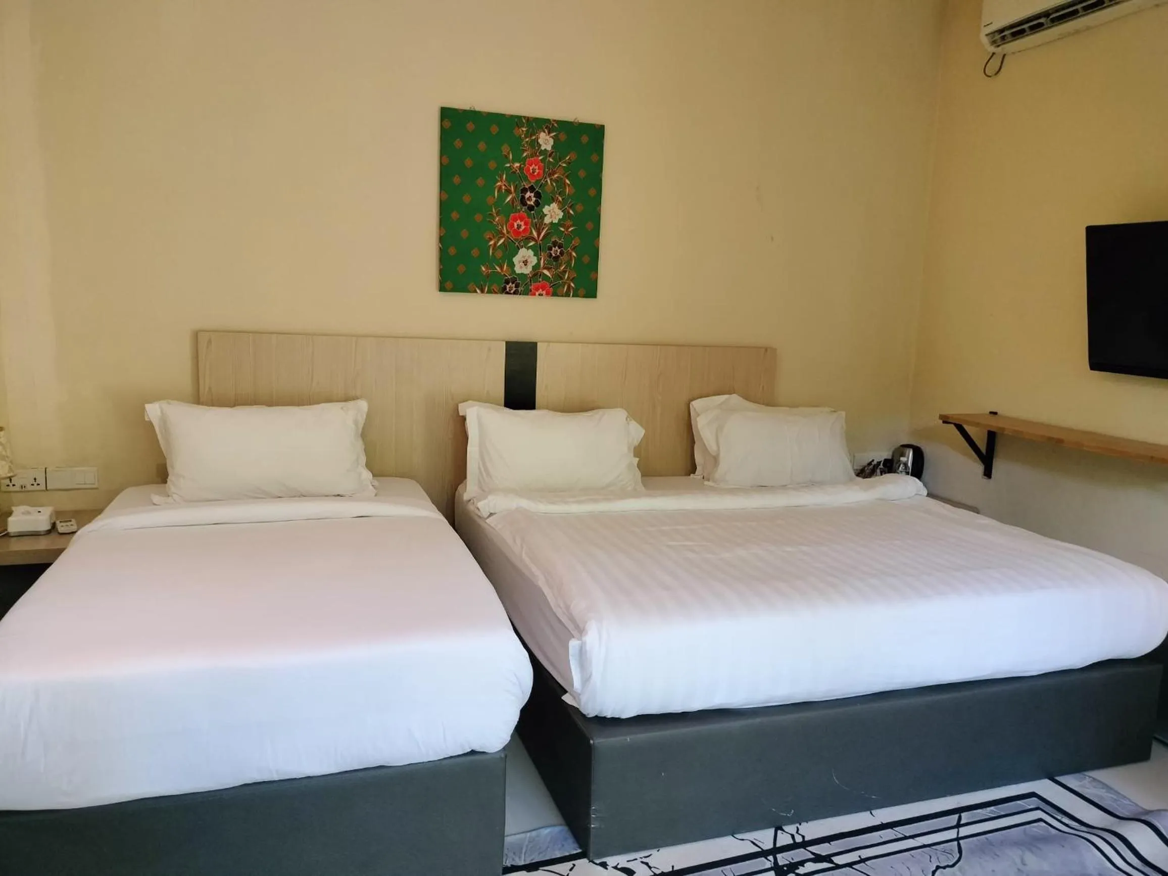 Bed in The Firefly Resort