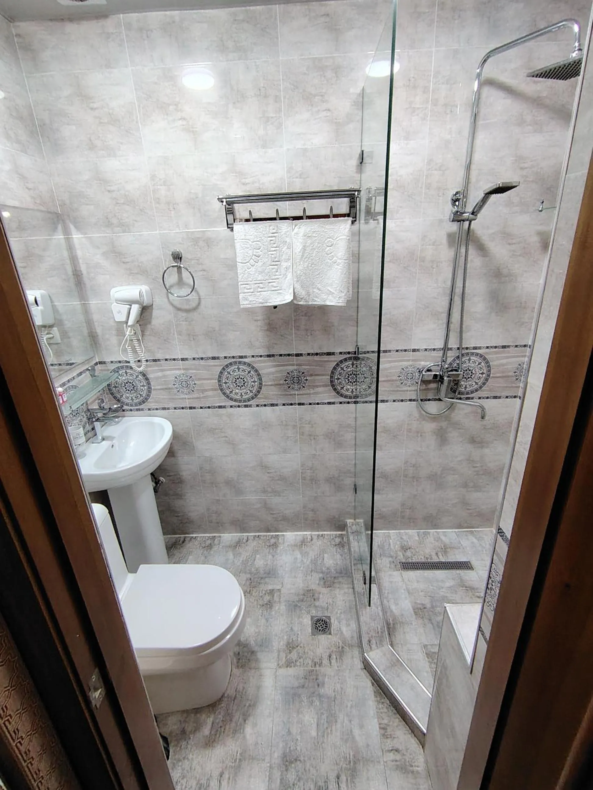 Comfort Triple Room with Shower - single occupancy in Nodirabegim Boutique Hotel