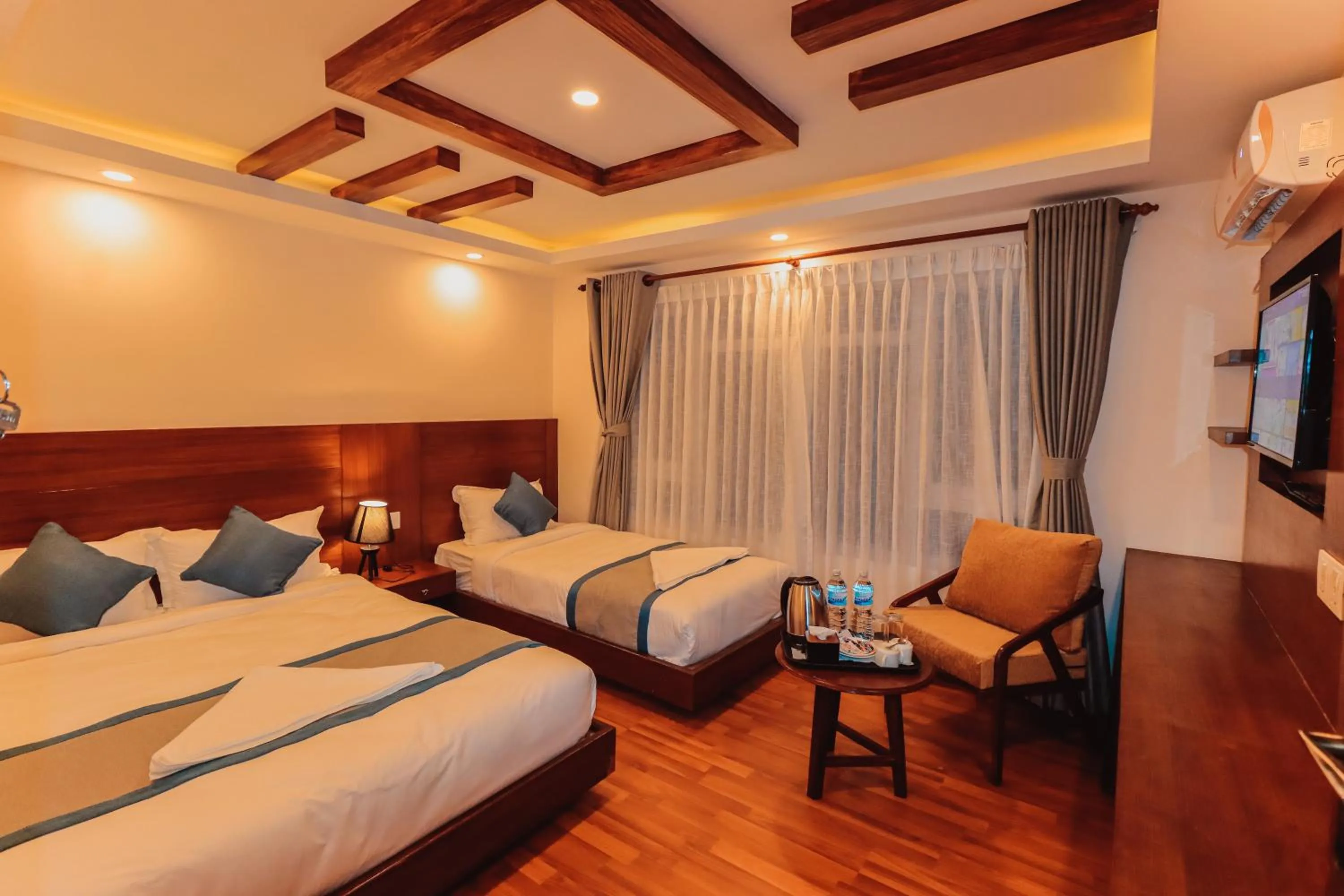 Photo of the whole room, Bed in Kathmandu Aagantuk Hotel