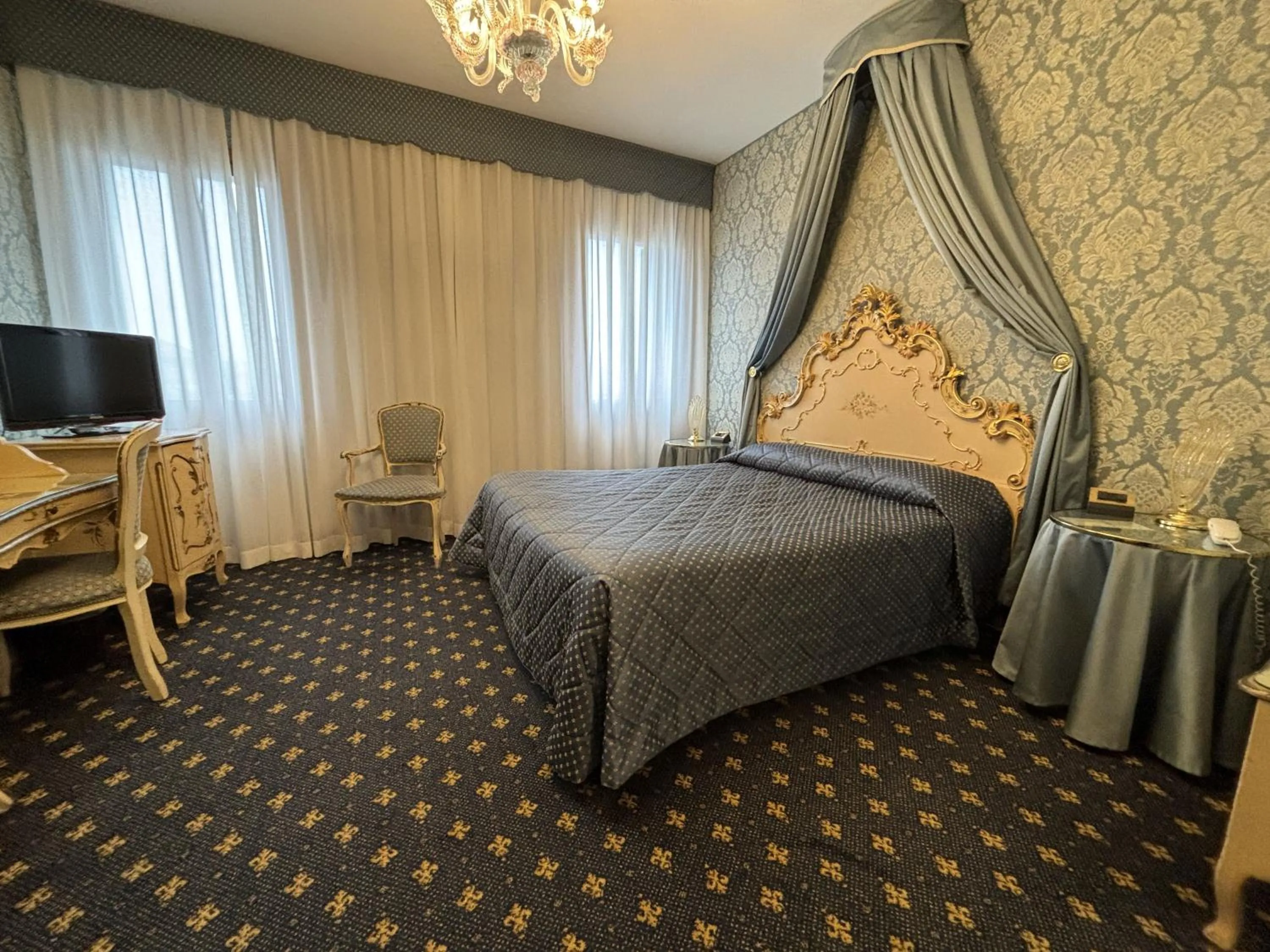 Bed in Hotel Rialto