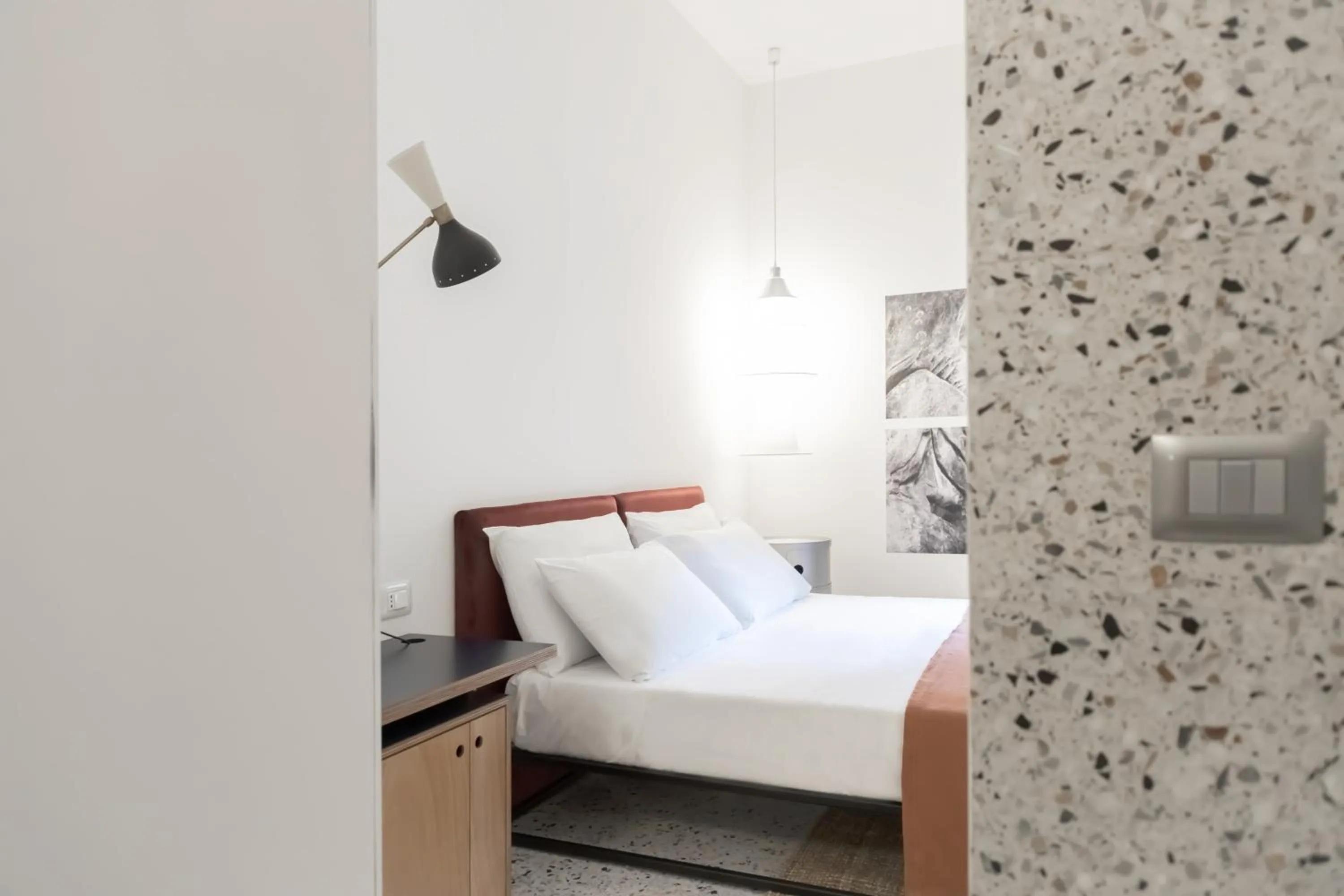 Bed in Hotel Dolomiti