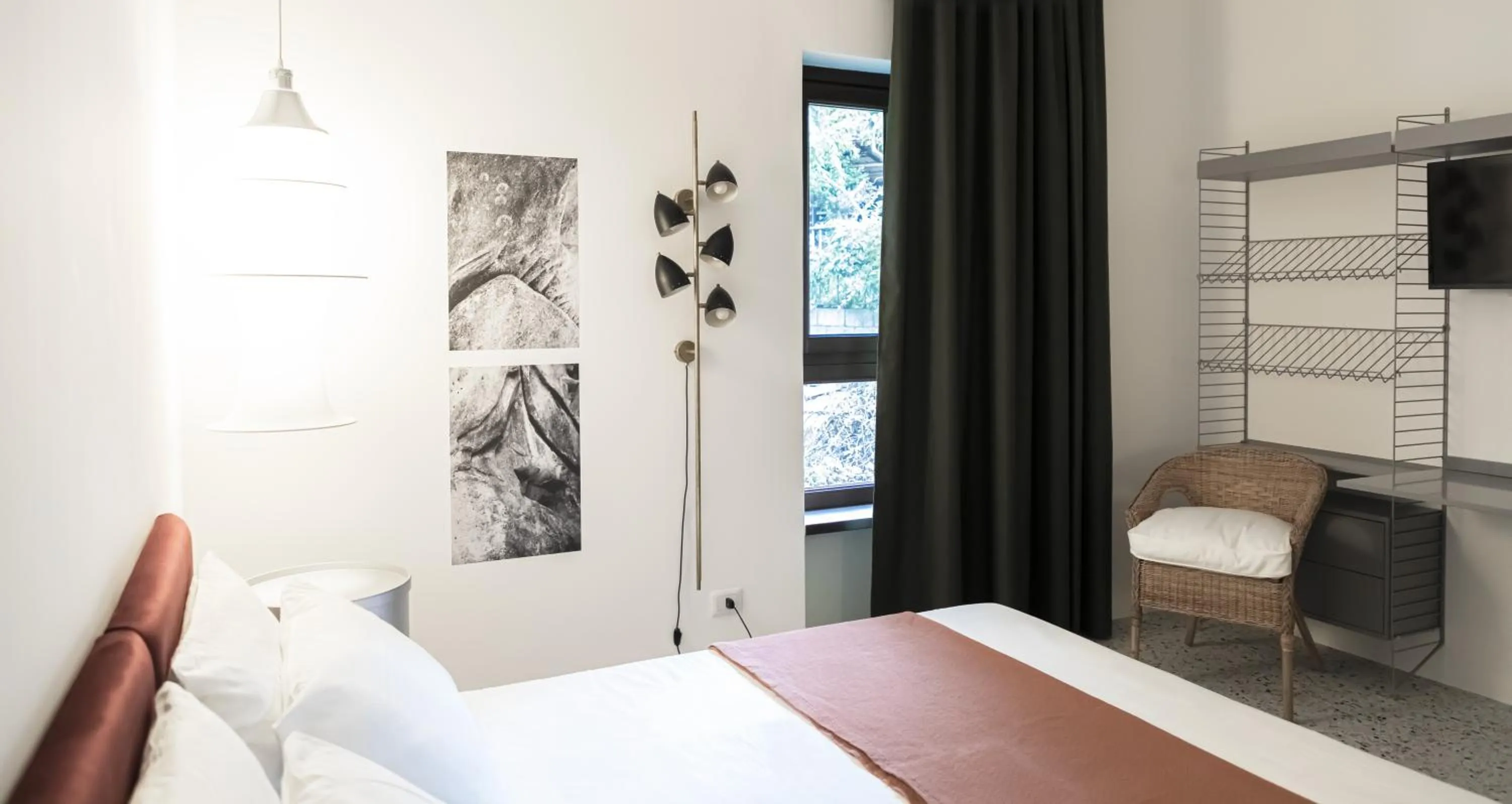 Bed in Hotel Dolomiti