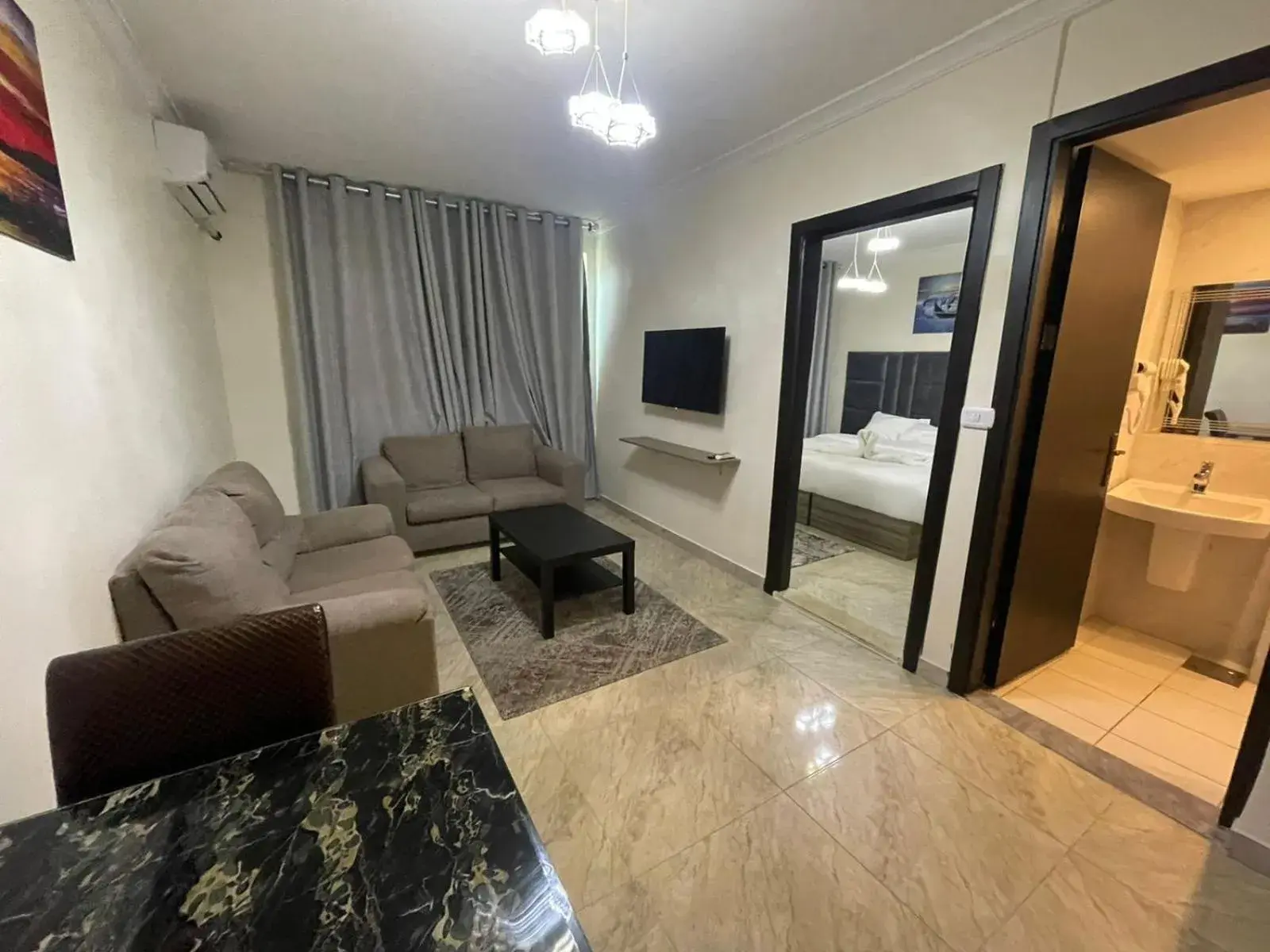 Communal lounge/ TV room, Bed in Golden Hotel Communal lounge/ TV room, Bed in Golden Hotel