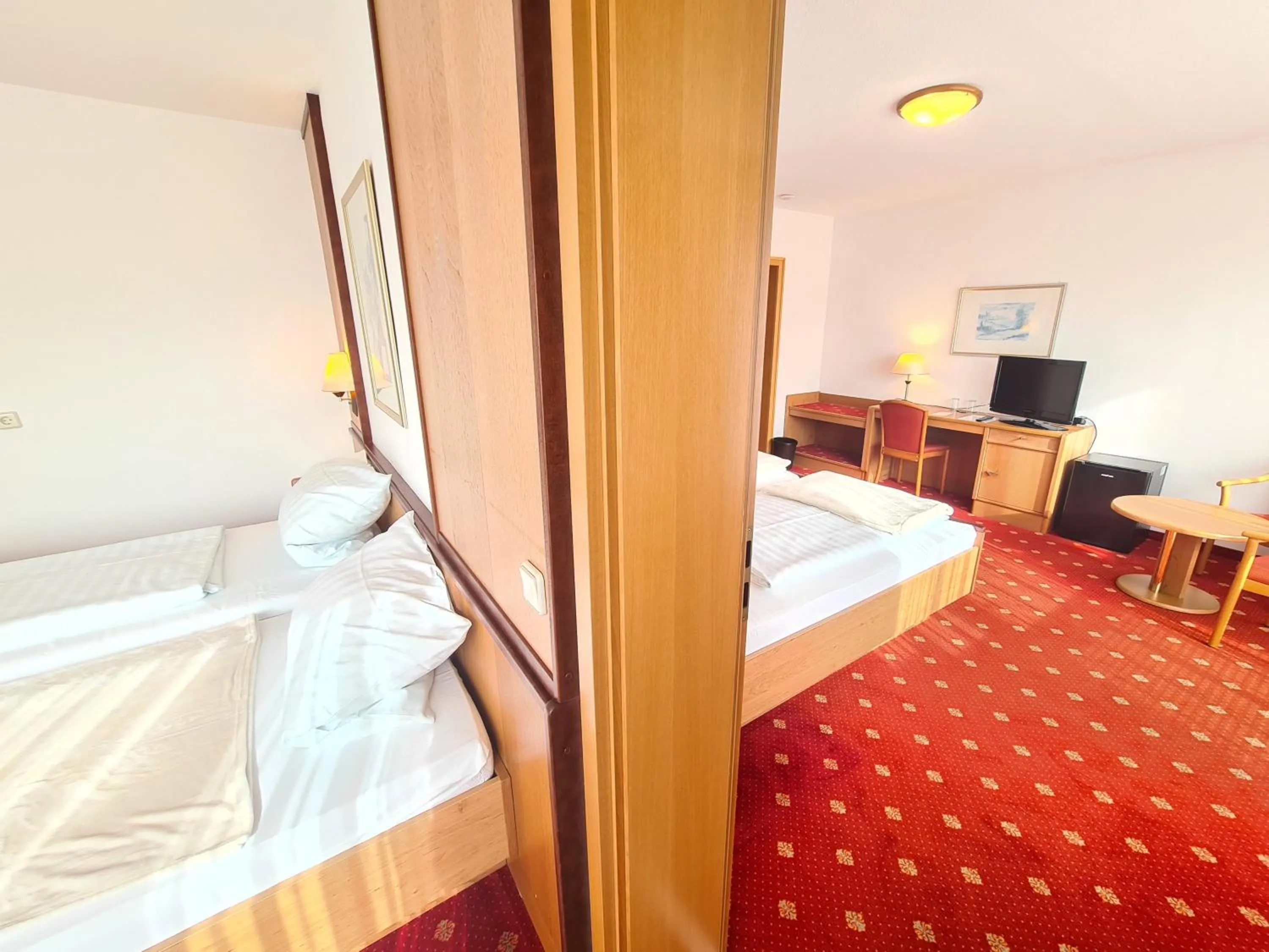 Bed in Thermenhotel Tannenhof - Ihr Wohlfühl-Hotel