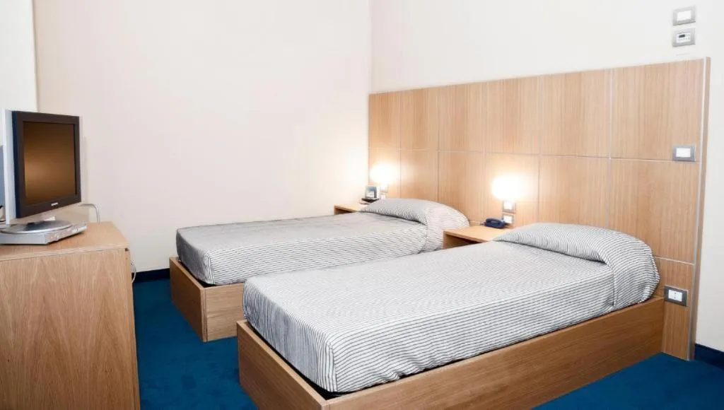 Photo of the whole room, Bed in Hotel Delle Fiere