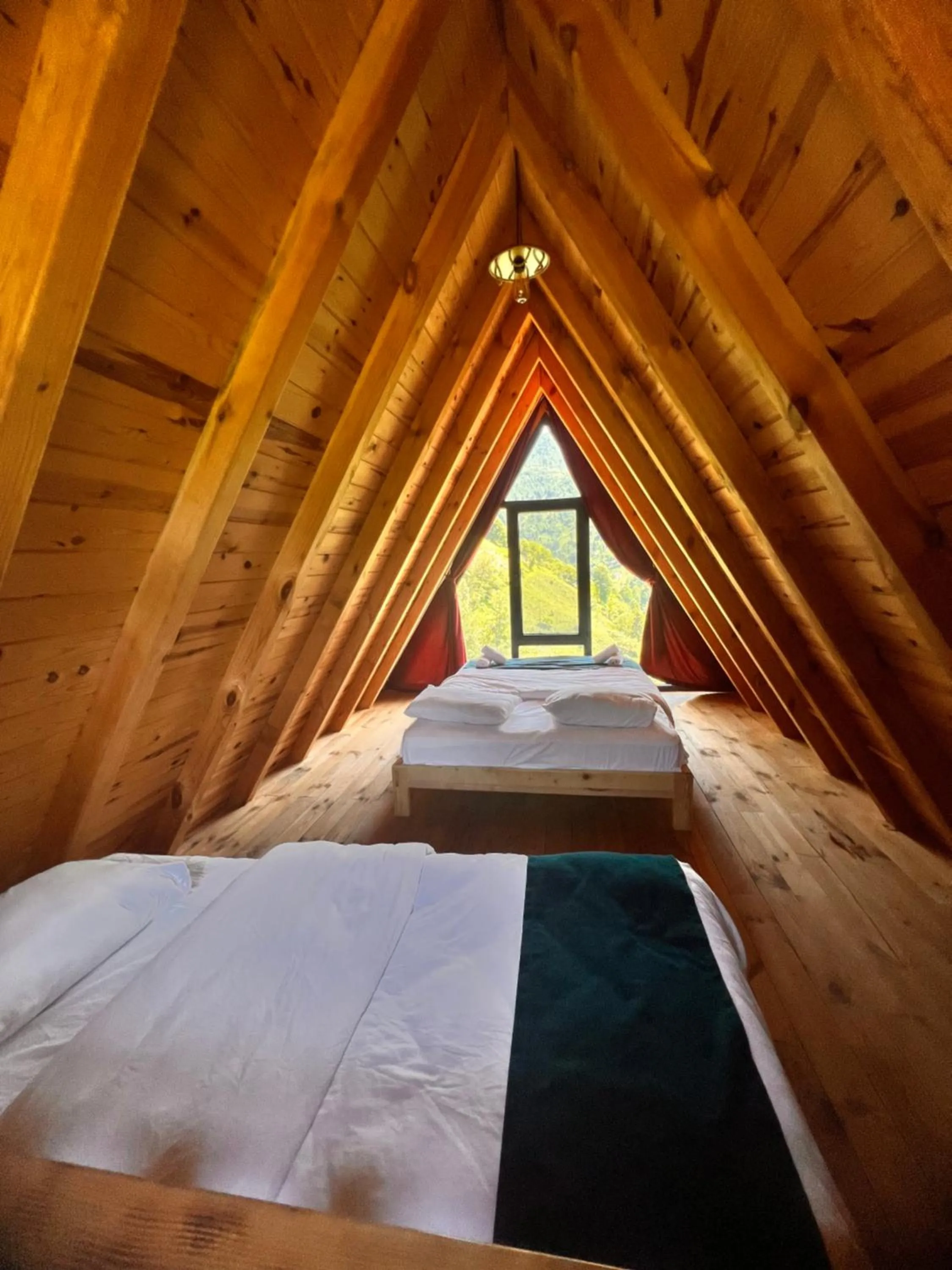 Bed in Northland Bungalows