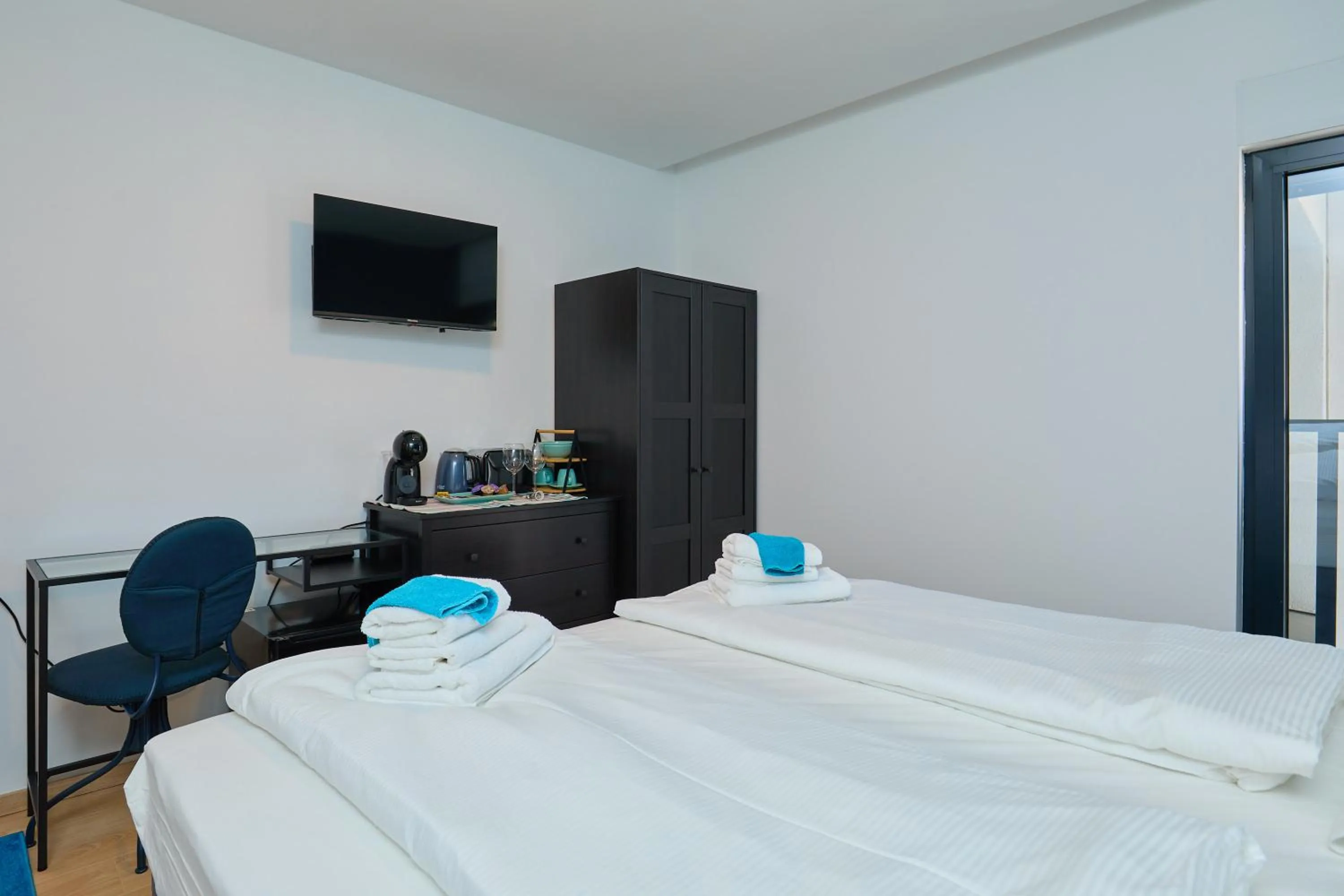 Bed in DOMINIUM CITY SUITES