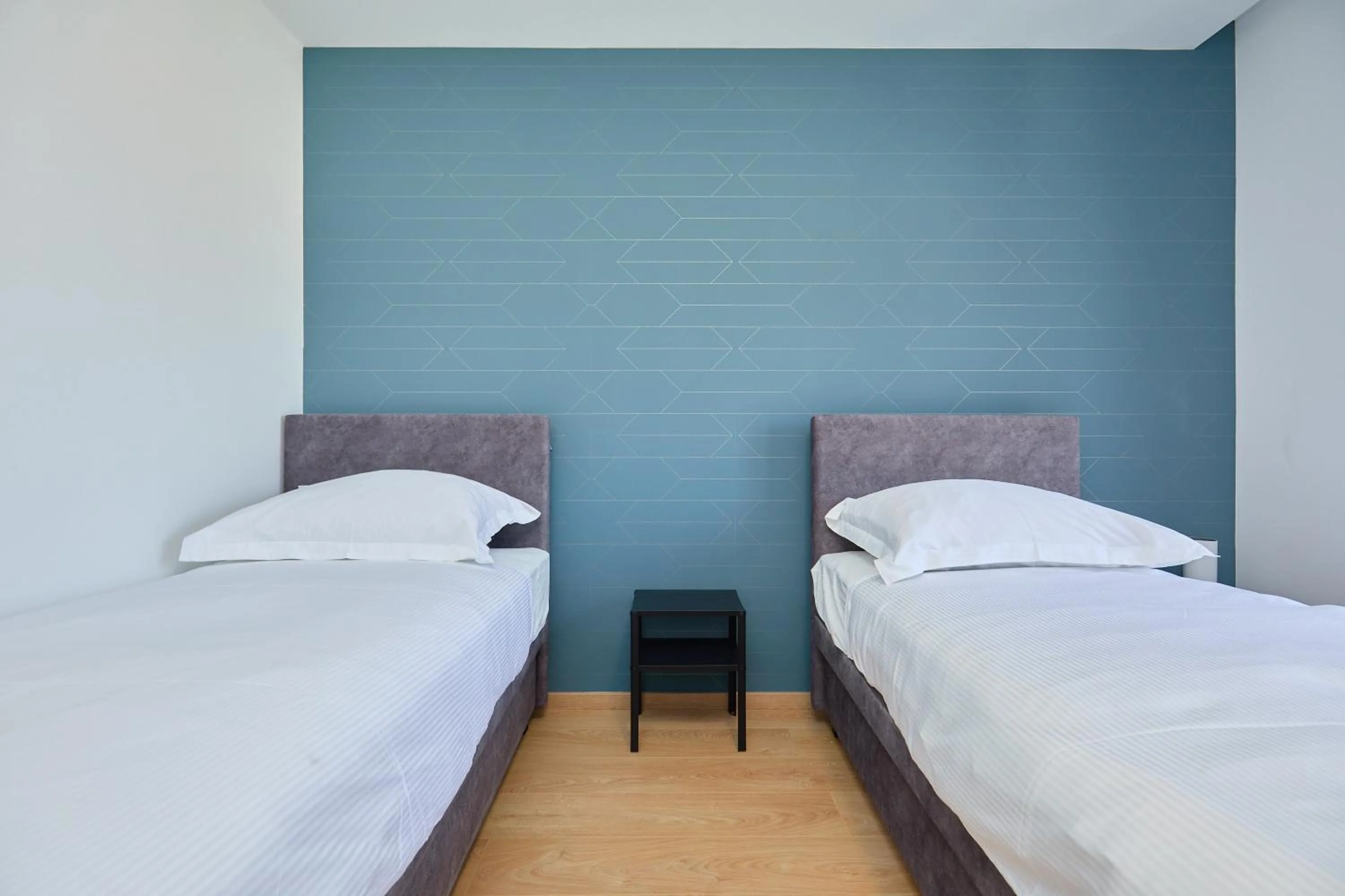 Bed in DOMINIUM CITY SUITES