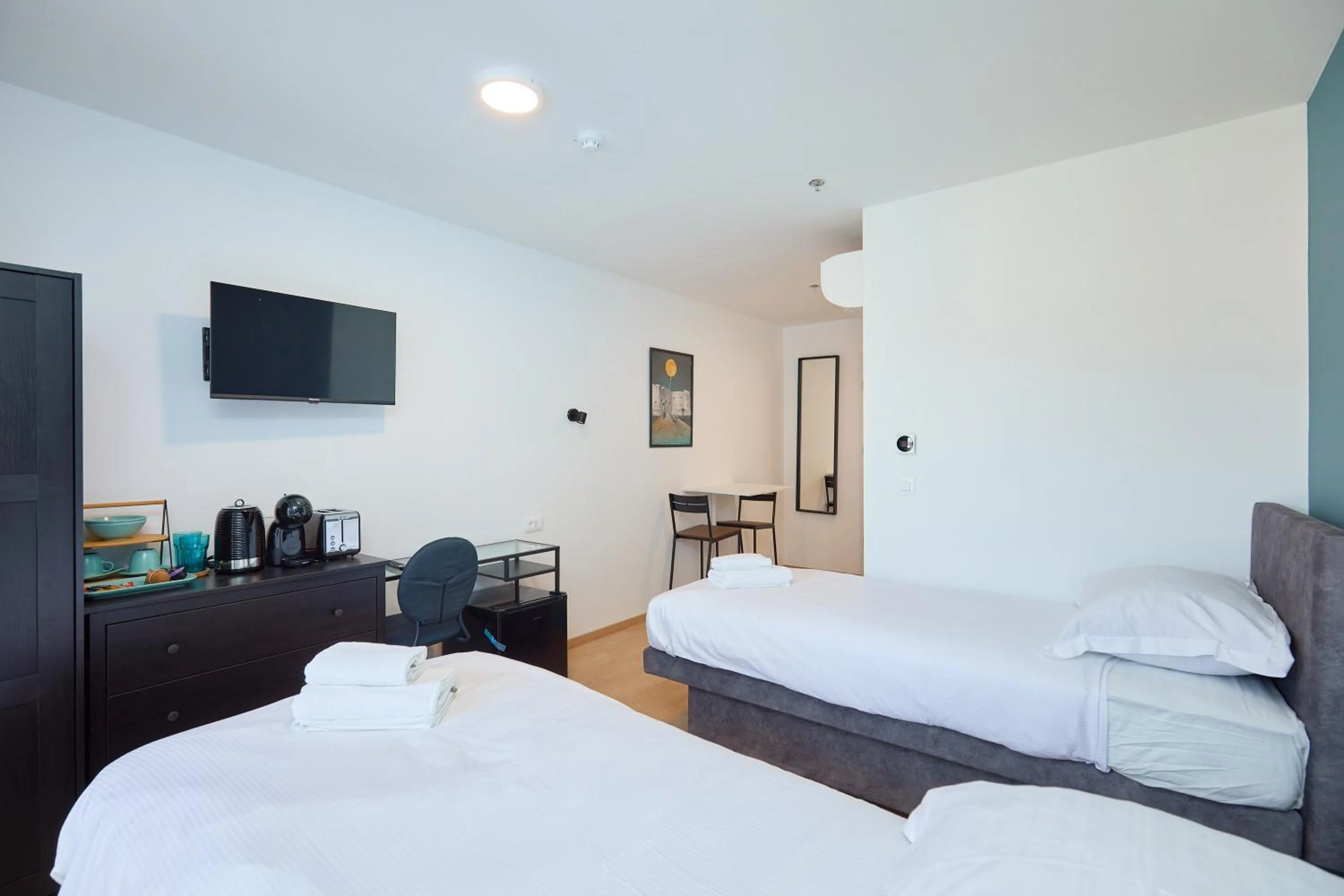 Bed in DOMINIUM CITY SUITES