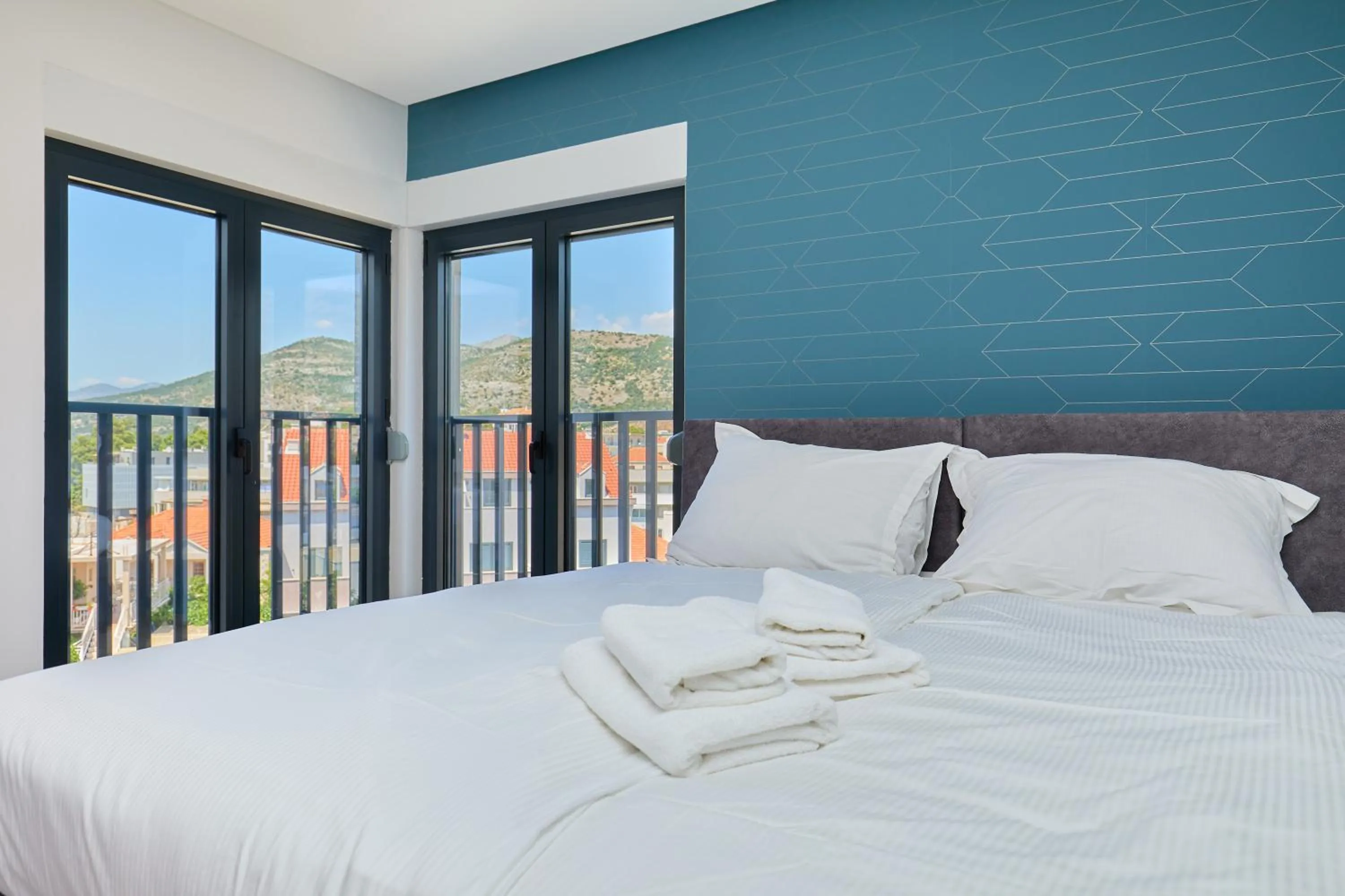 Bed in DOMINIUM CITY SUITES