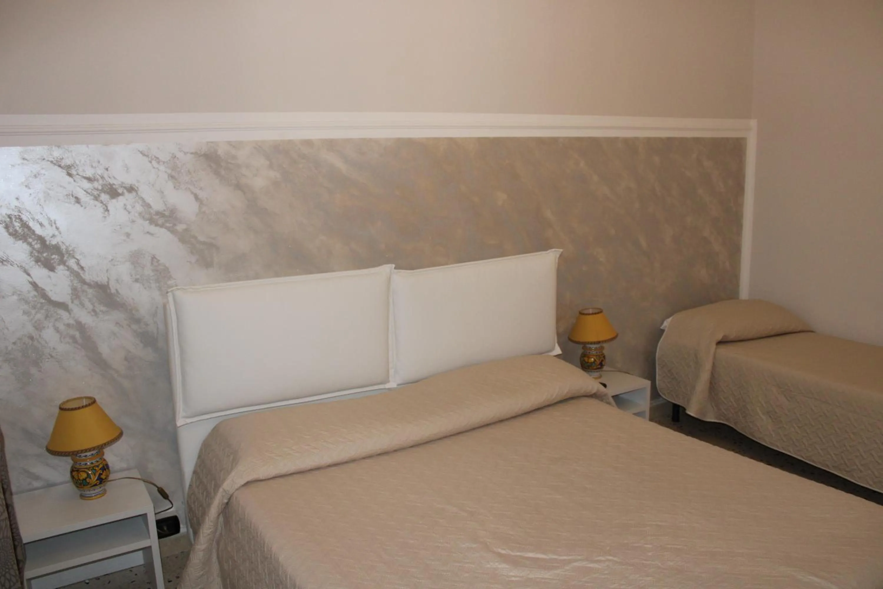 Bed in B&B Il Giardino Delle Meraviglie