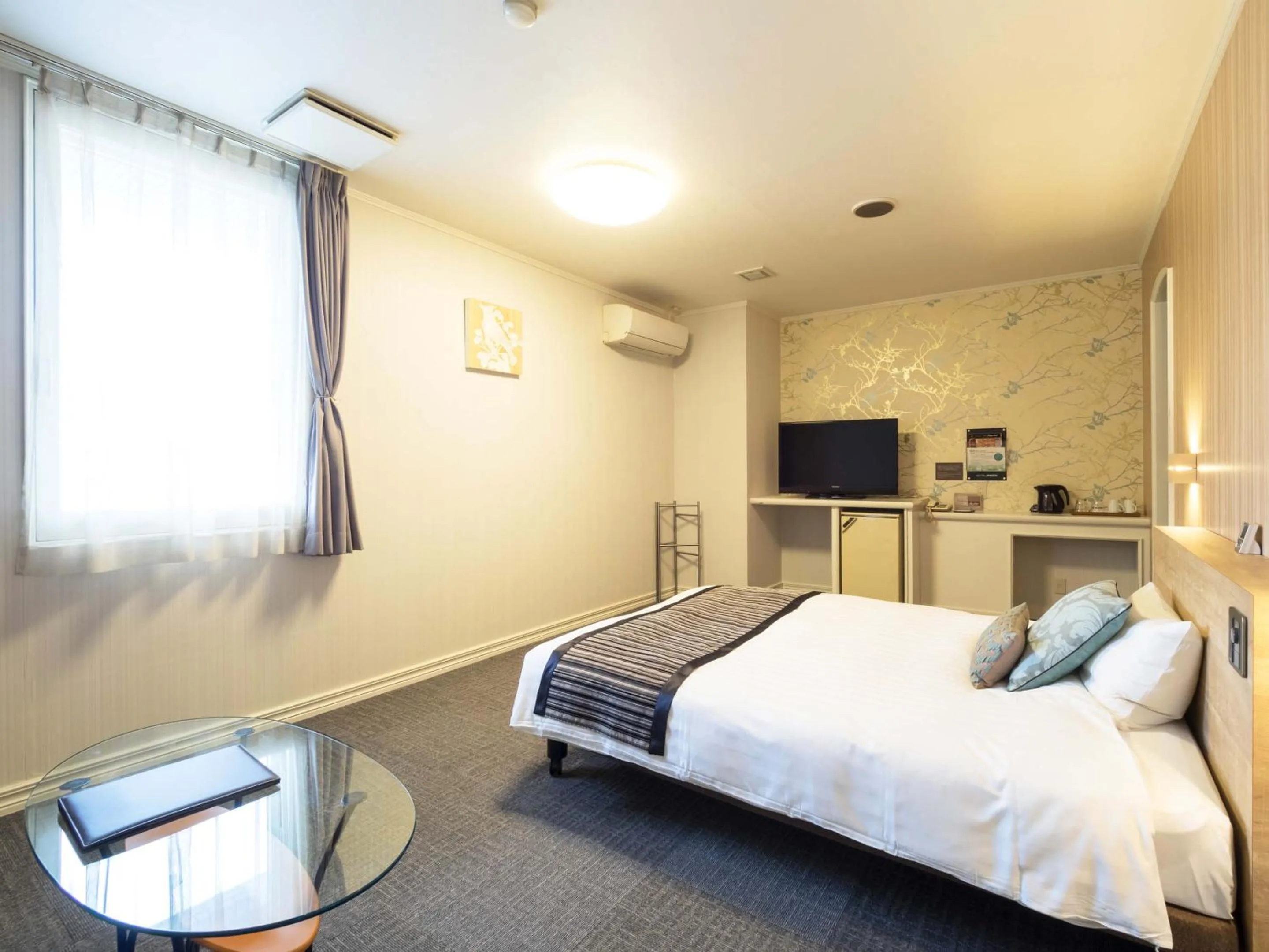 Photo of the whole room, Bed in Hotel AreaOne Obihiro