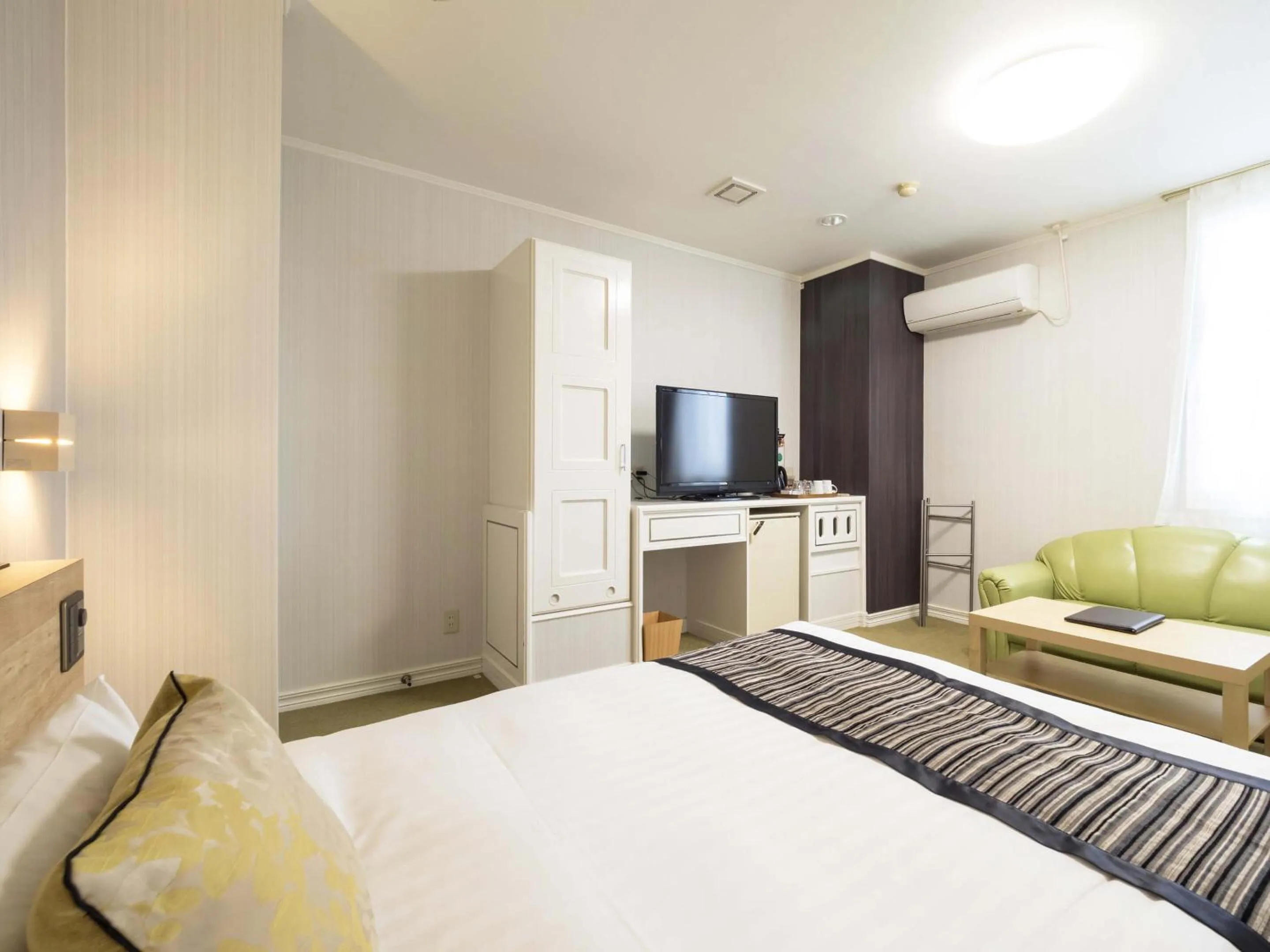 Photo of the whole room, Bed in Hotel AreaOne Obihiro