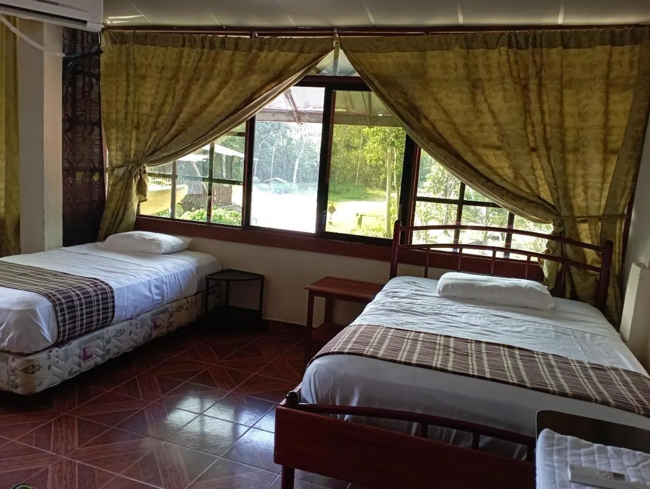 Bed in Grand Selva Lodge & Tours