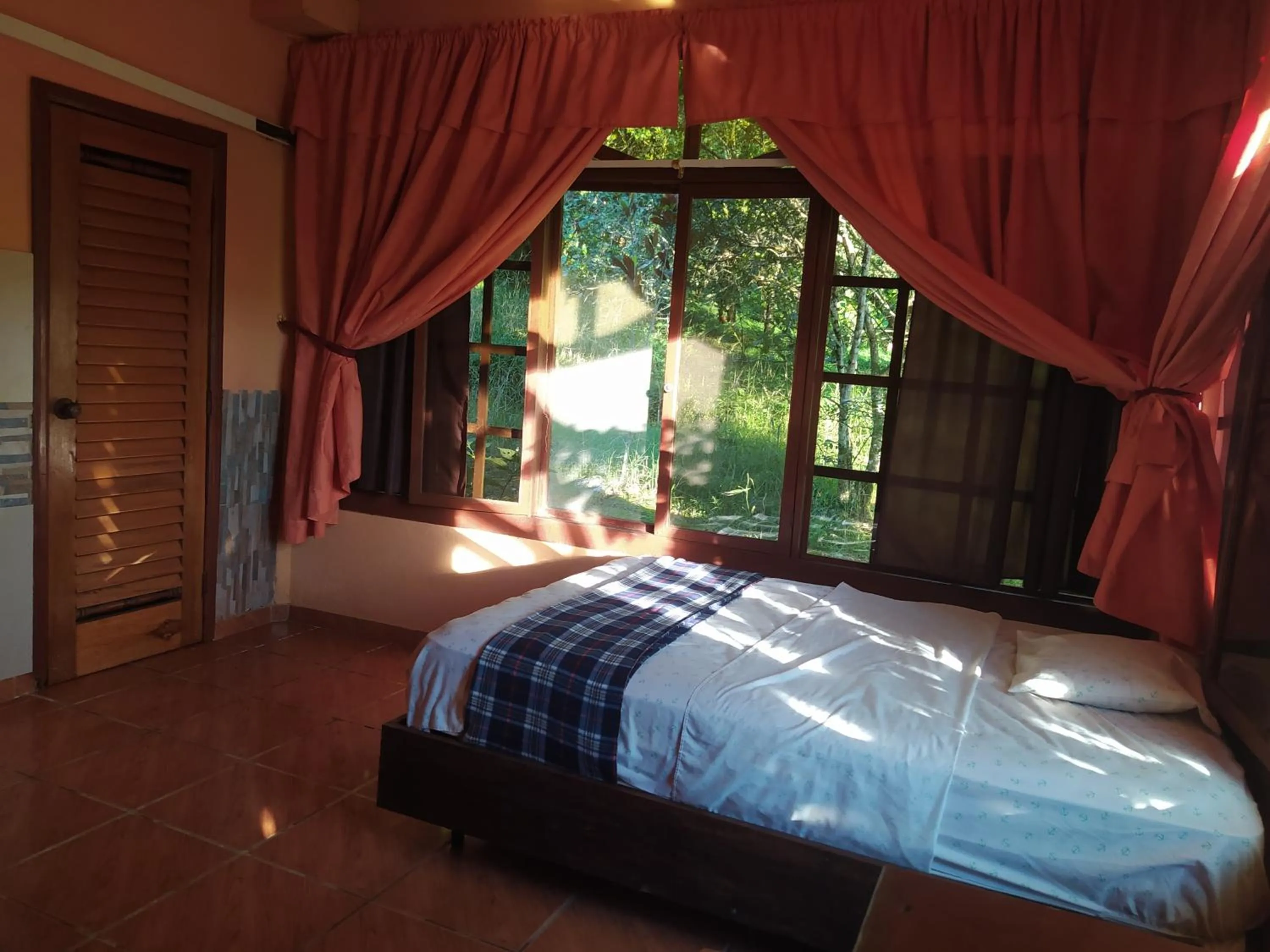 Bedroom, Bed in Grand Selva Lodge & Tours