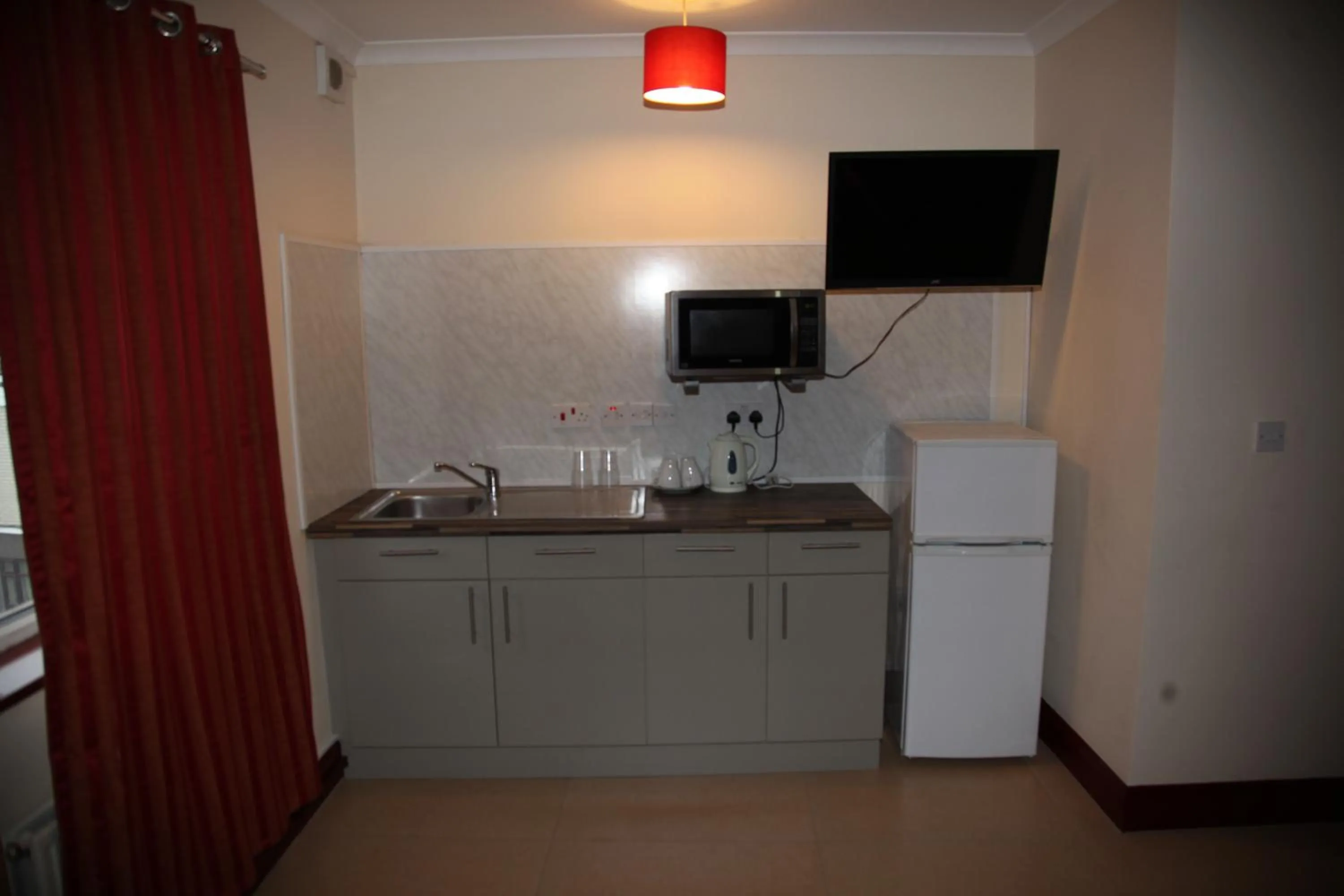 Kitchen or kitchenette in Grove Apartments