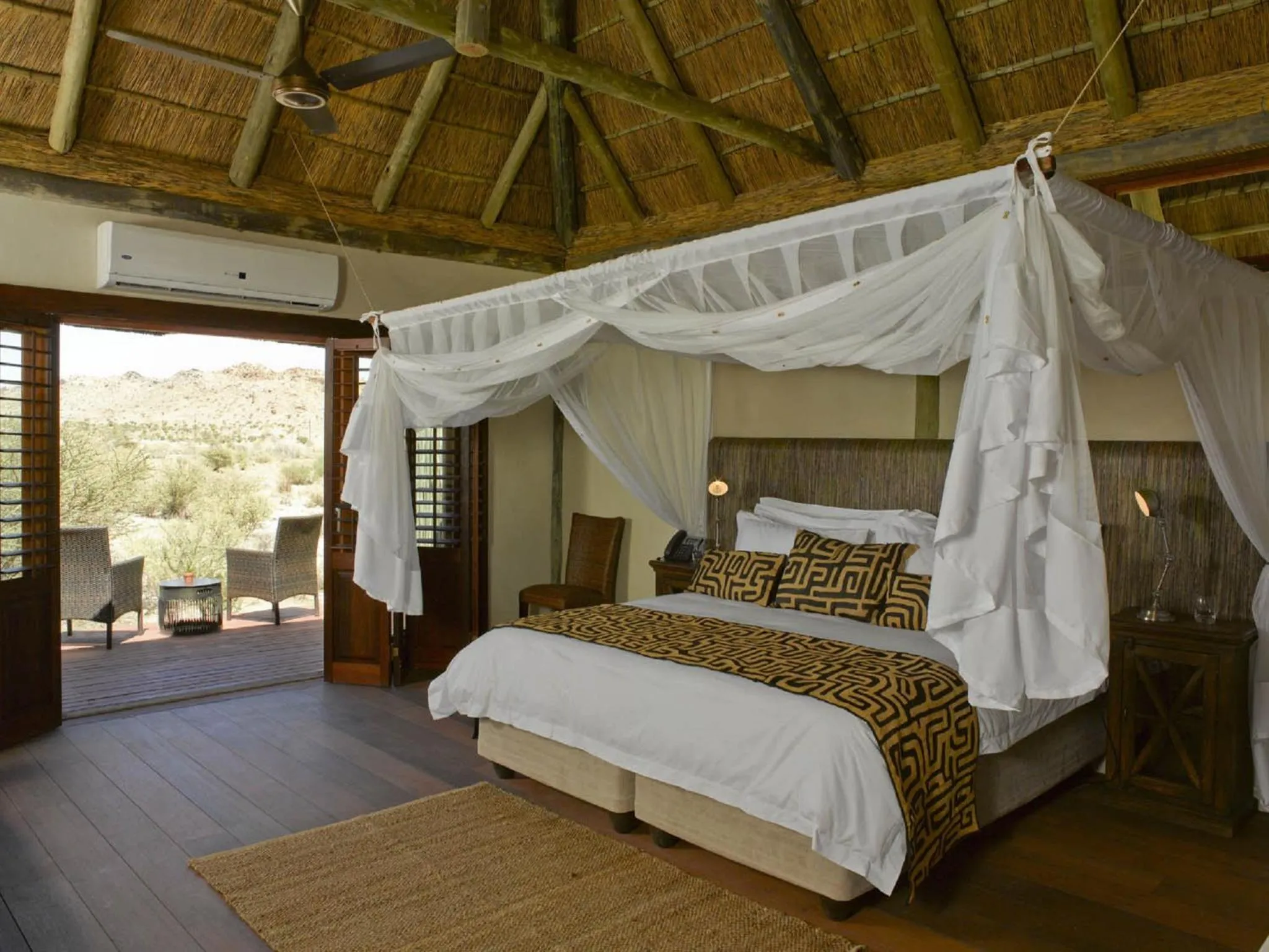 Patio, Bed in Tutwa Desert Lodge