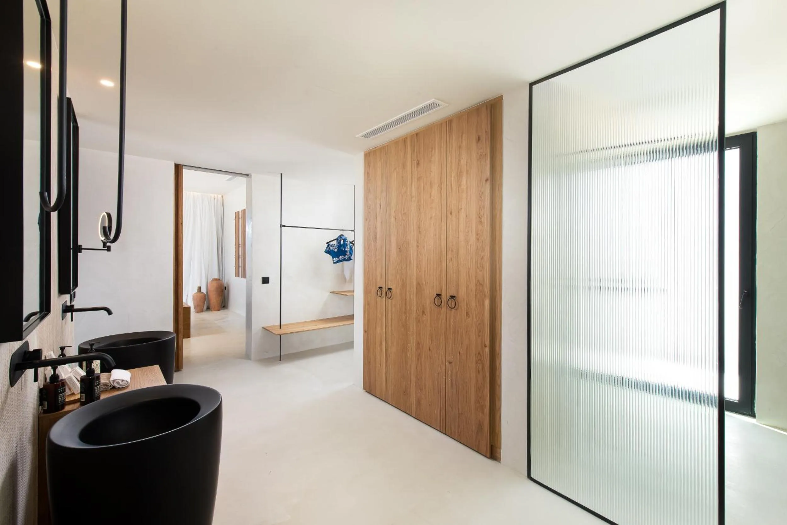 Shower in KOIA All - Suite Well Being Resort - Adults Only