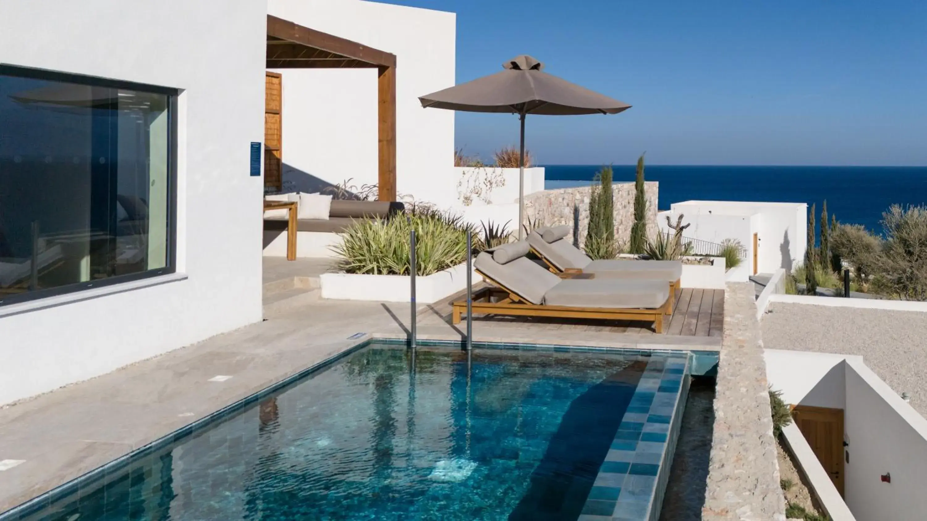Swimming pool in KOIA All - Suite Well Being Resort - Adults Only Swimming pool in KOIA All - Suite Well Being Resort - Adults Only
