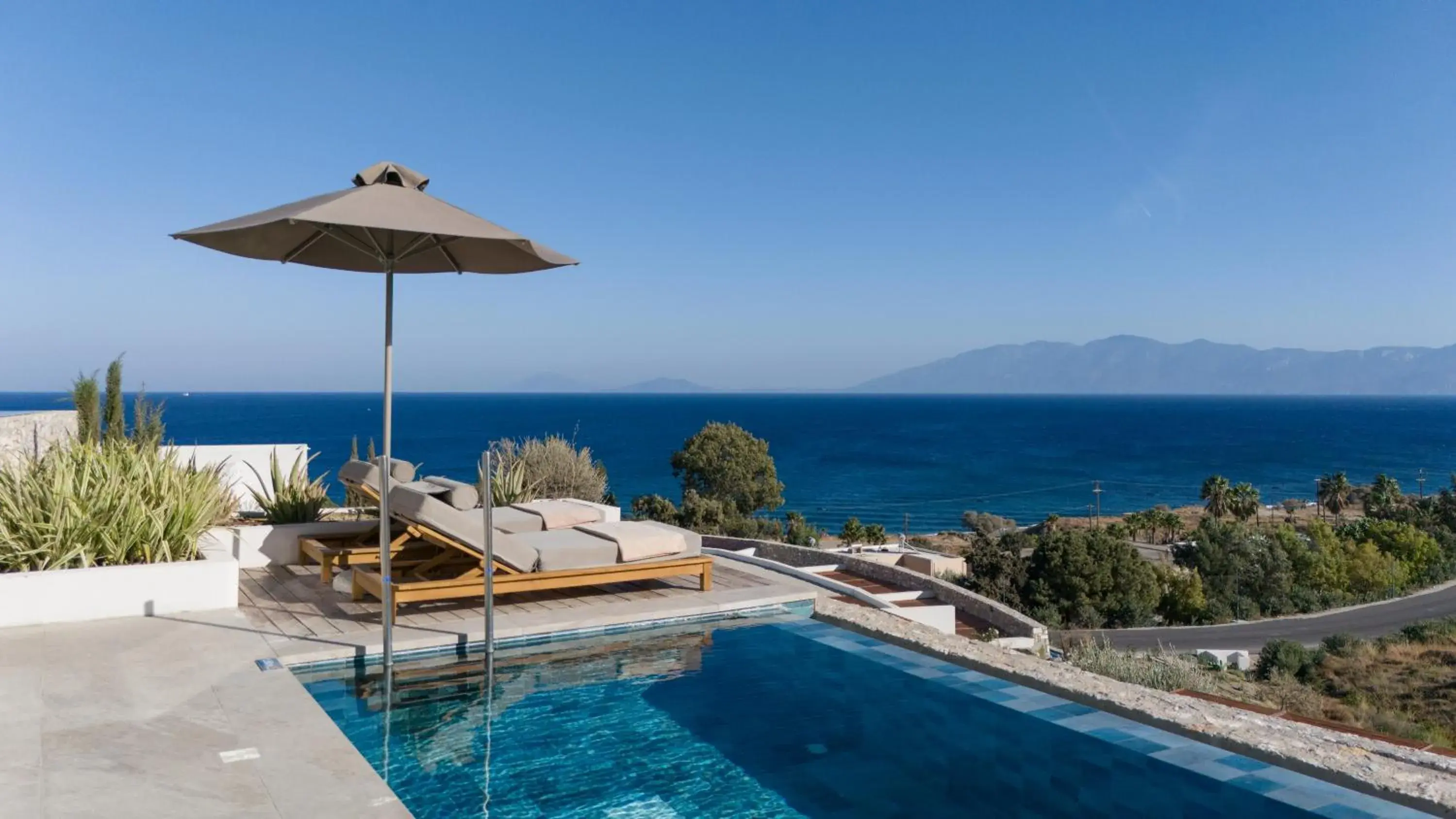 Swimming pool in KOIA All - Suite Well Being Resort - Adults Only Swimming pool in KOIA All - Suite Well Being Resort - Adults Only