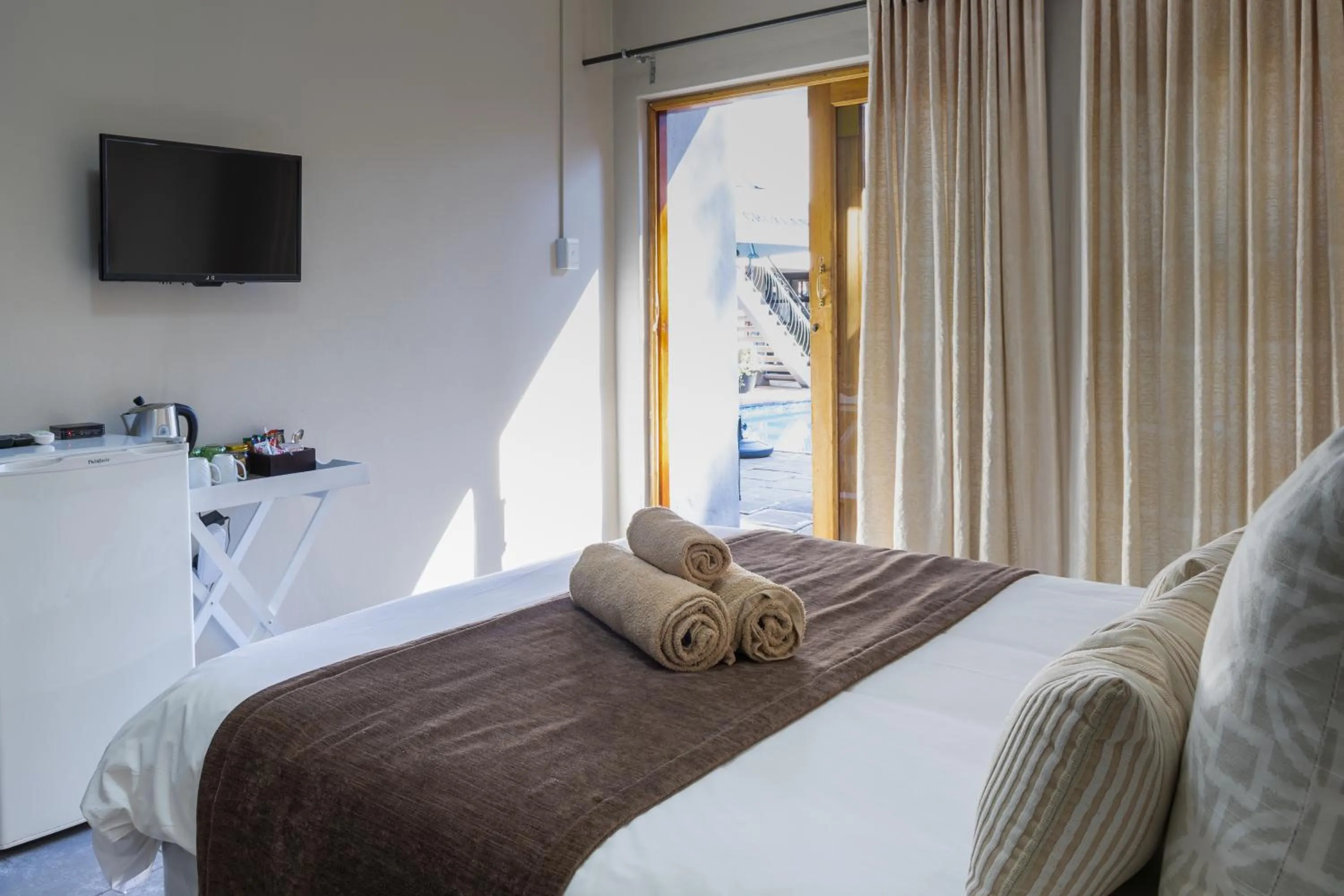 Toilet, Bed in Solo Gracia Guesthouse