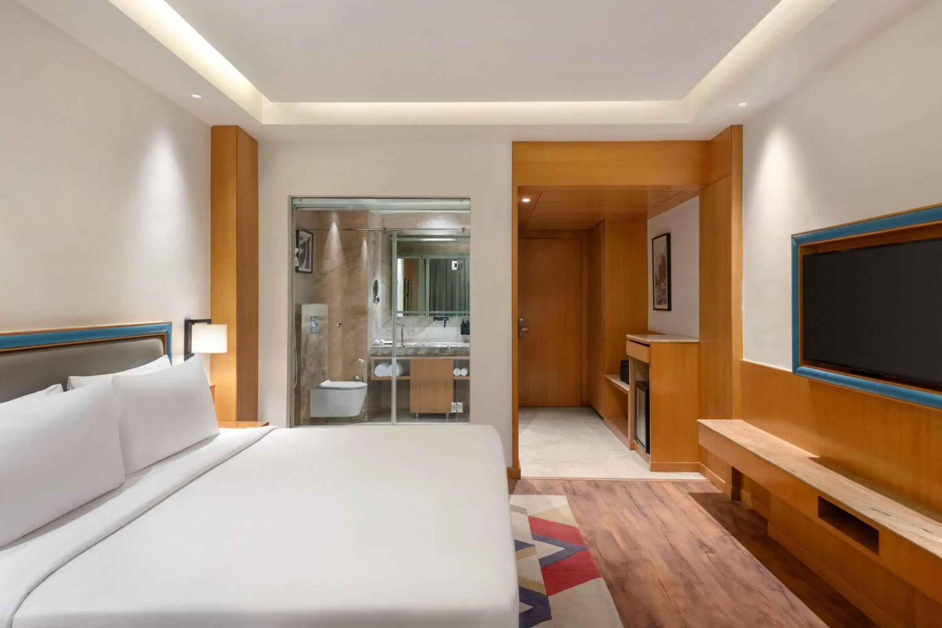 Photo of the whole room, Bed in Ramada by Wyndham Katra Station Road Photo of the whole room, Bed in Ramada by Wyndham Katra Station Road