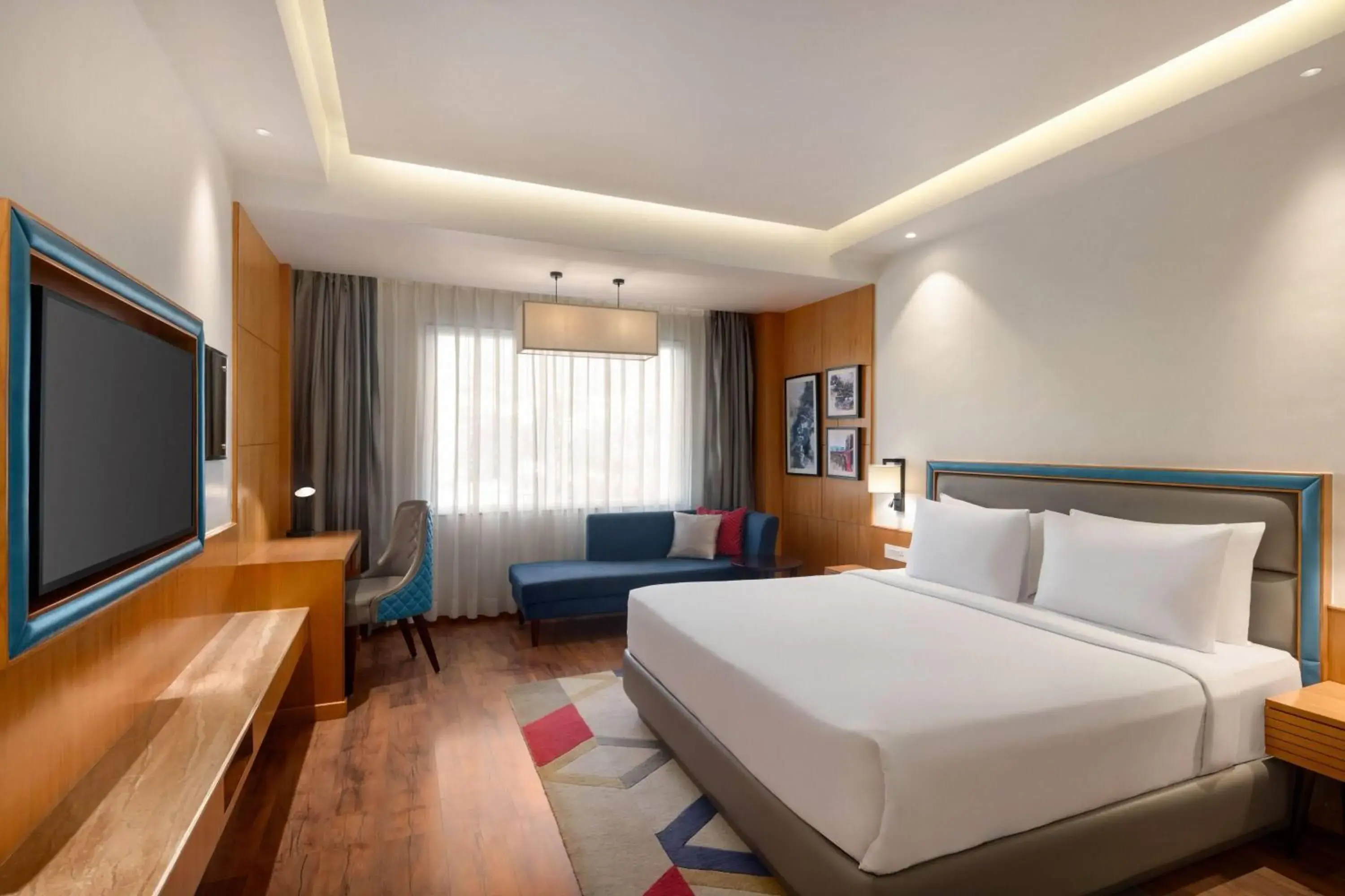 Photo of the whole room, Bed in Ramada by Wyndham Katra Station Road Photo of the whole room, Bed in Ramada by Wyndham Katra Station Road