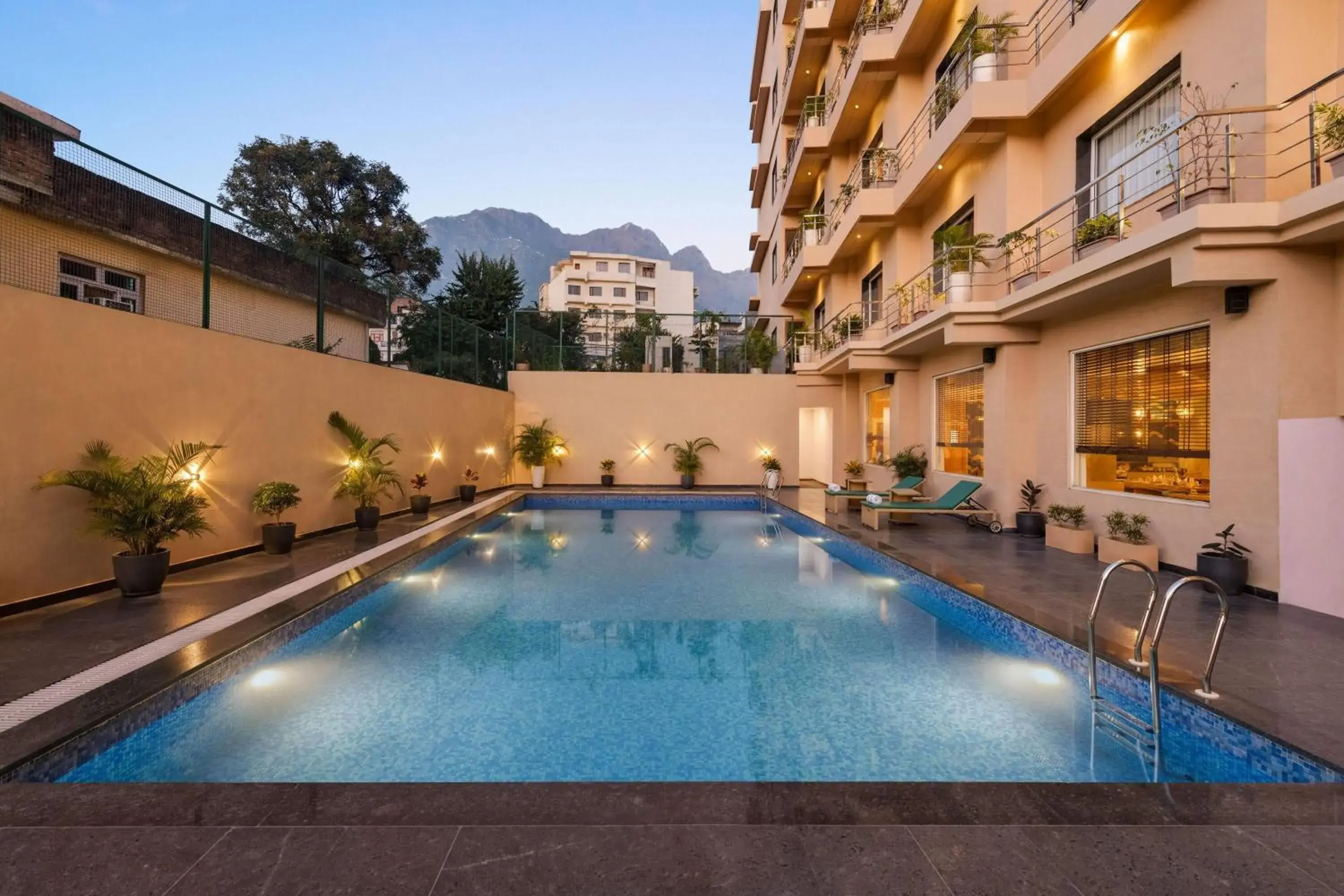 Swimming pool in Ramada by Wyndham Katra Station Road Swimming pool in Ramada by Wyndham Katra Station Road