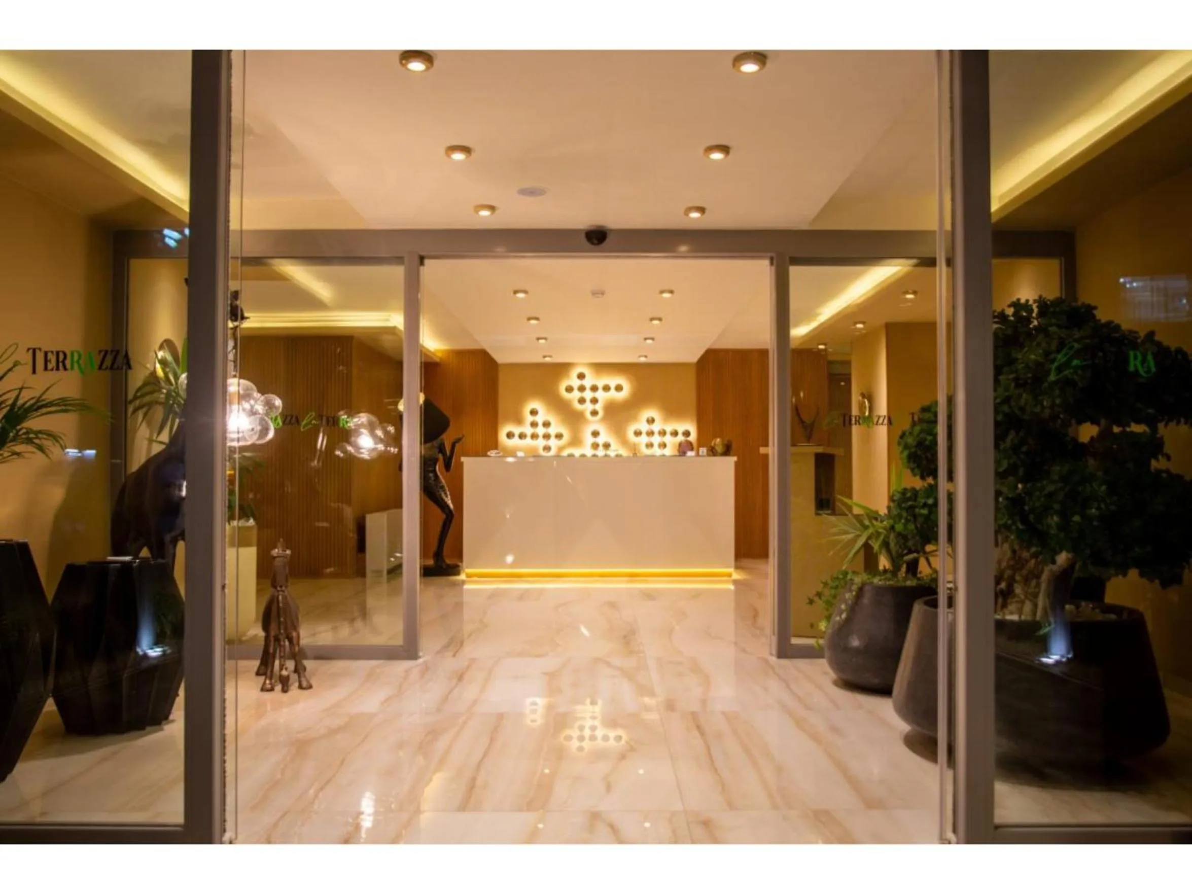 Lobby or reception in La Terrazza Hotel