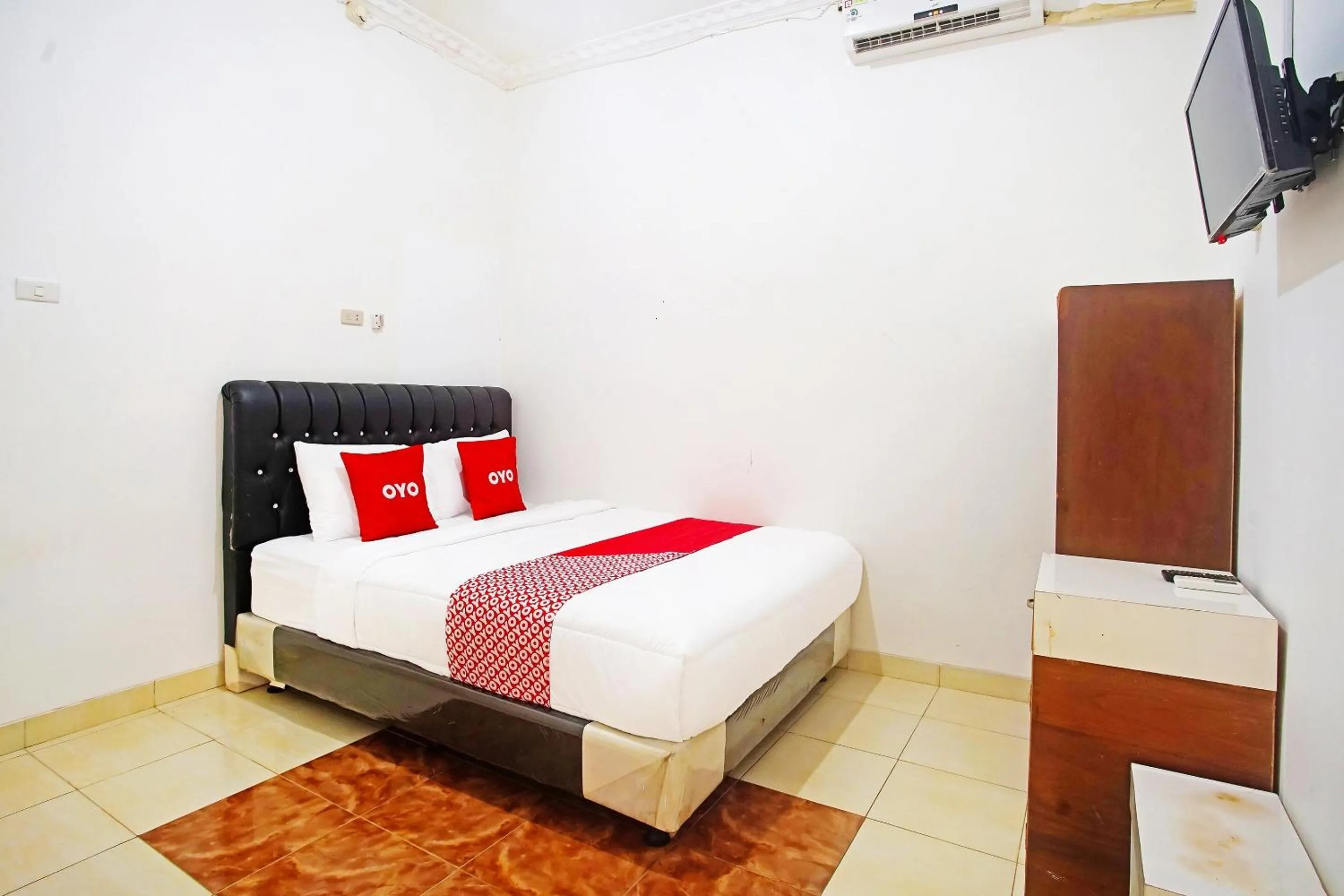 Bedroom in OYO 91460 Guest House Kencana Syariah