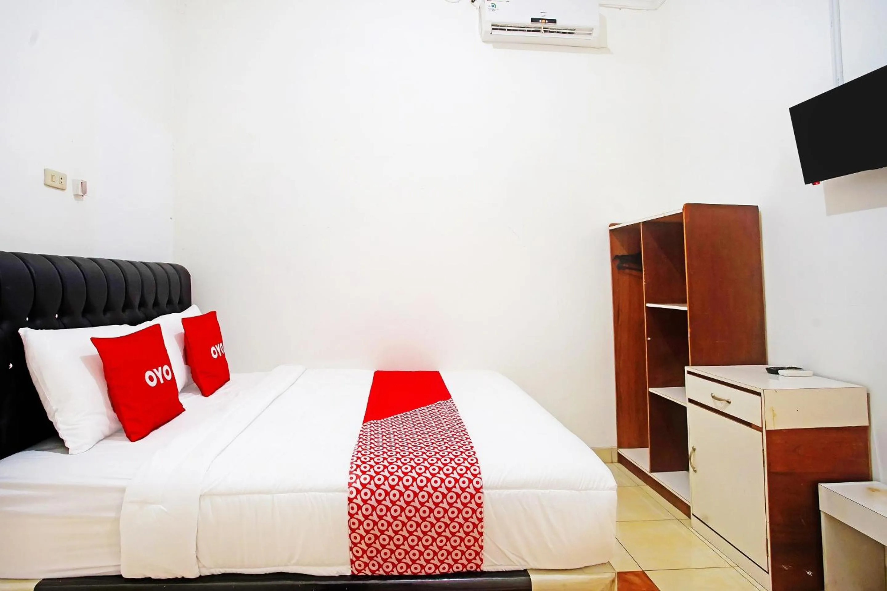 Bedroom in OYO 91460 Guest House Kencana Syariah