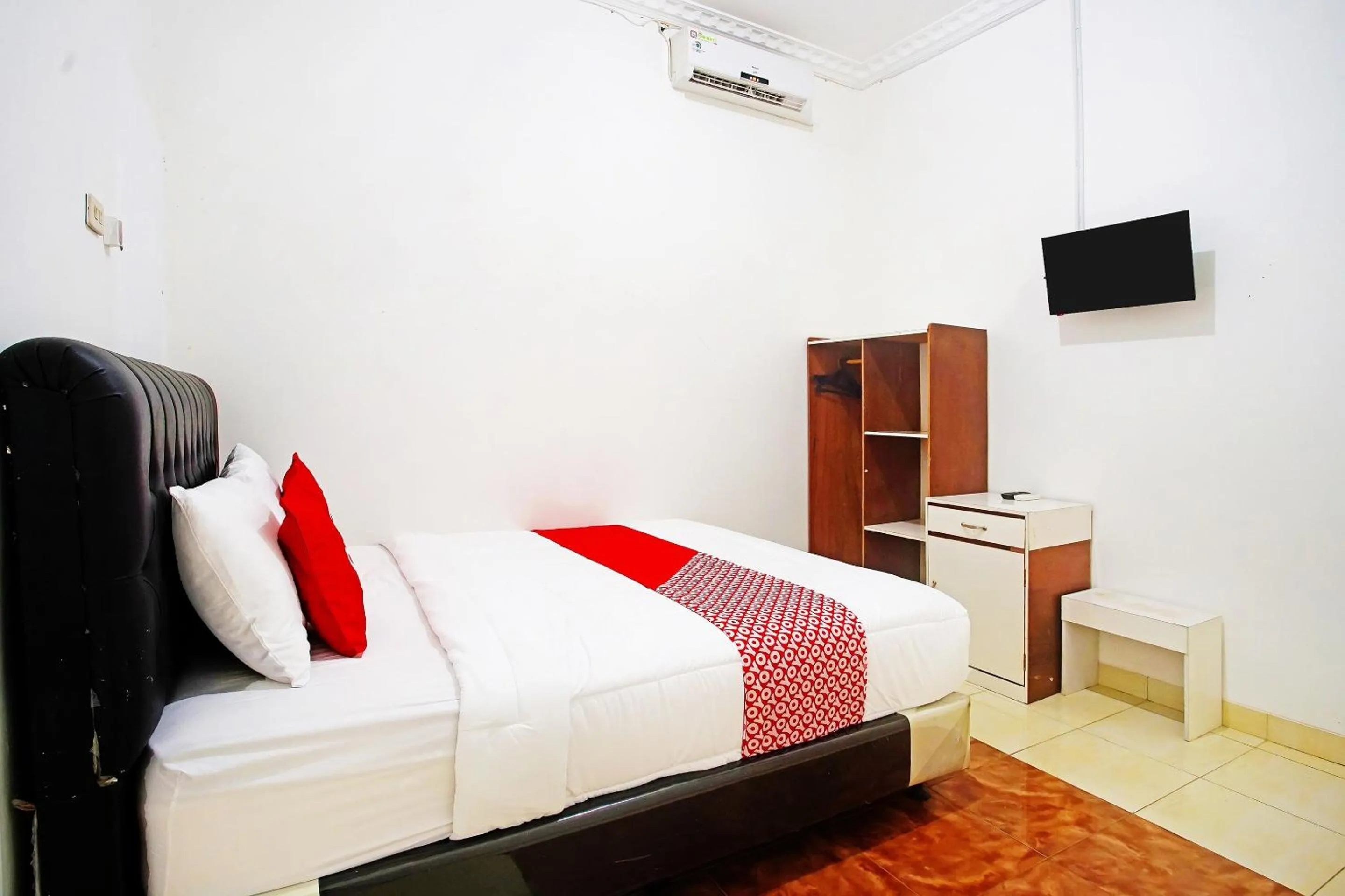 Bedroom in OYO 91460 Guest House Kencana Syariah