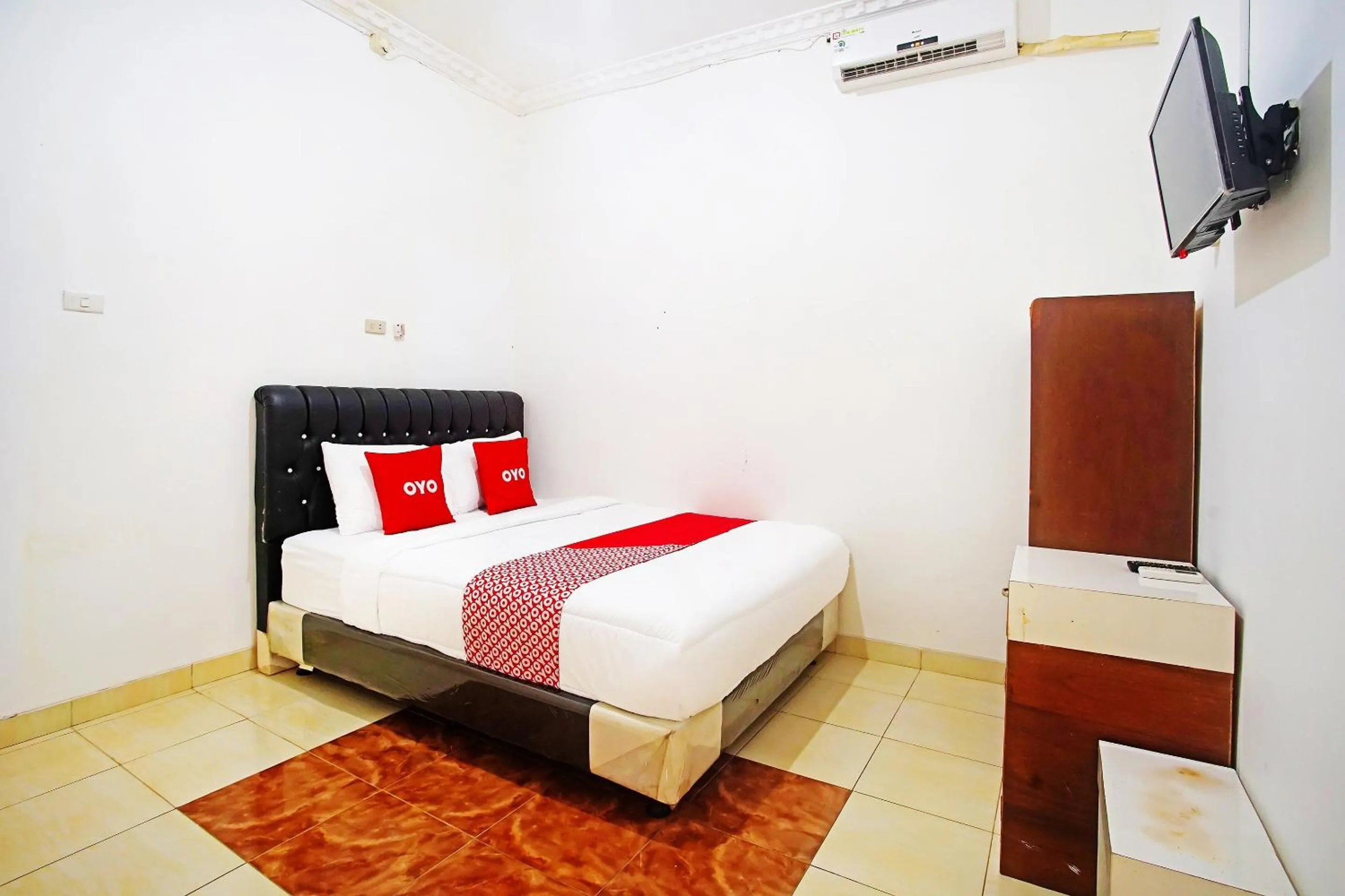 Bedroom in OYO 91460 Guest House Kencana Syariah