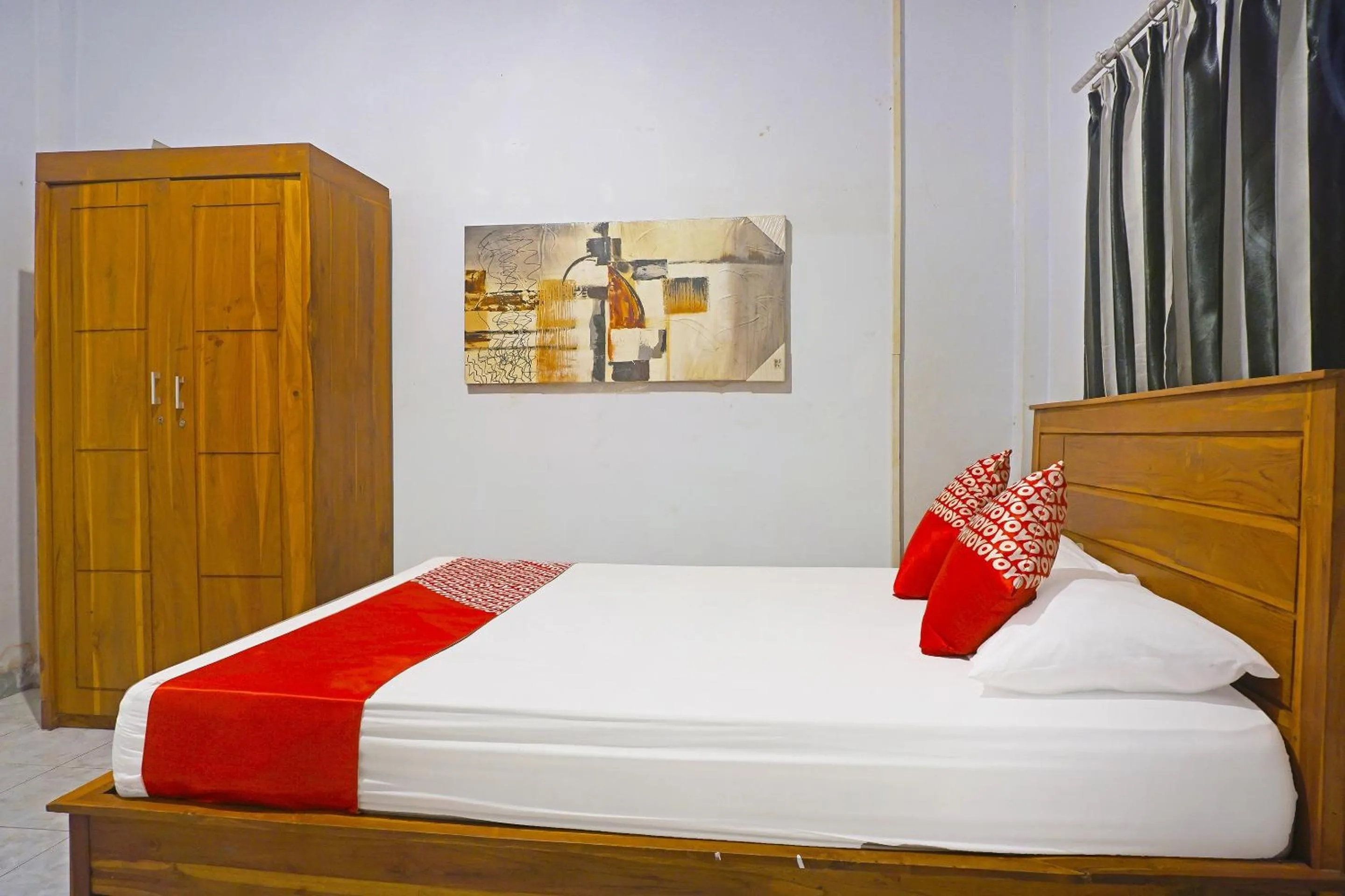Bedroom, Bed in Hotel O Anggrek Homes Makassar